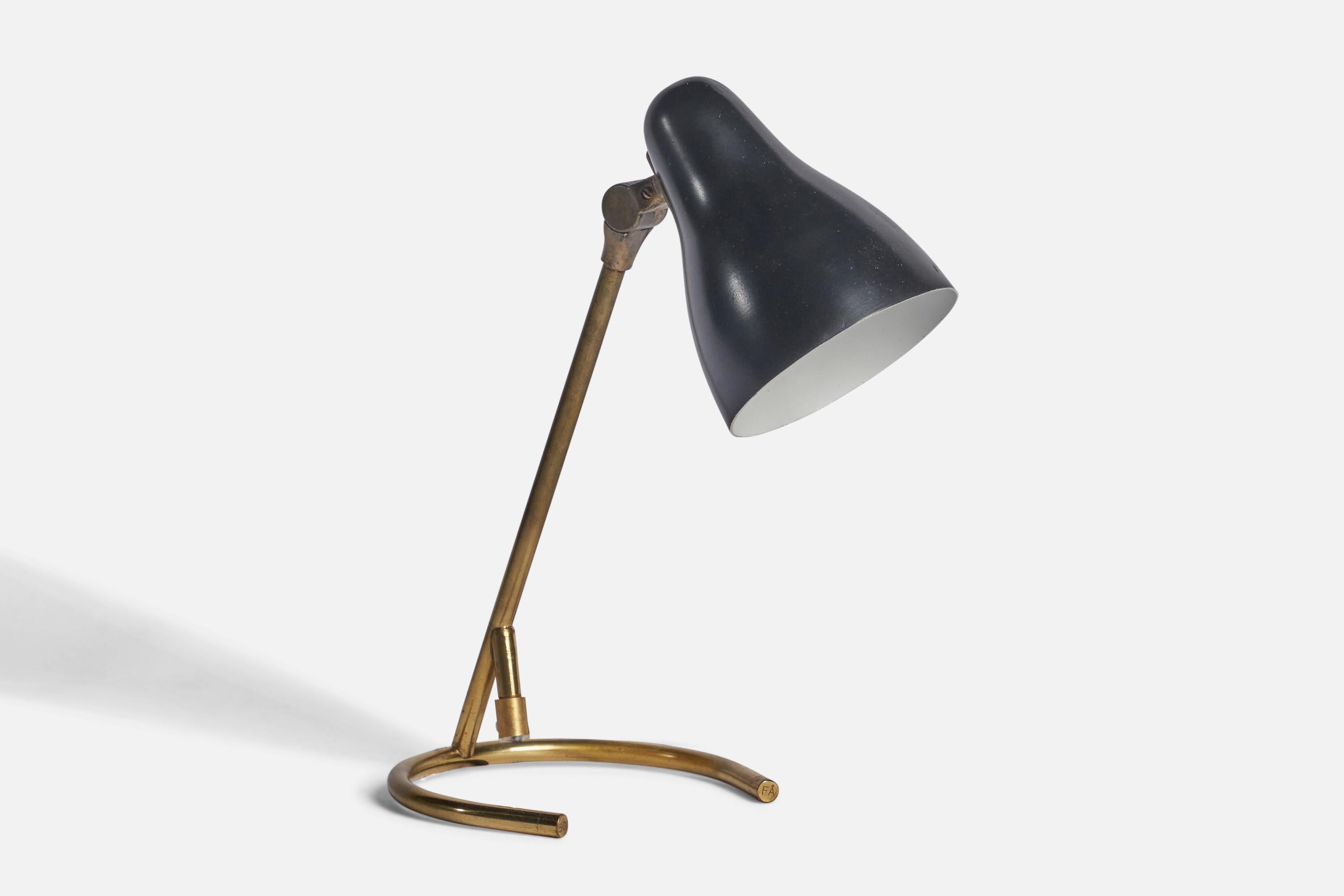 A brass and black-lacquered aluminium table lamp designed and produced in Sweden, 1950s.

Overall Dimensions (inches): 12” H x 6