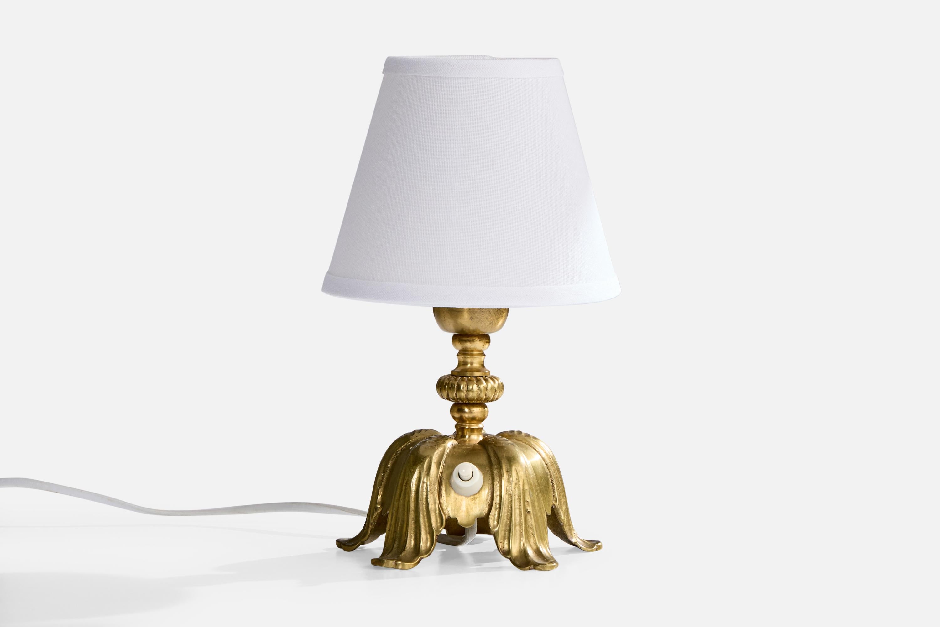 A brass table lamp designed and produced in Sweden, c. 1940s.

Dimensions of Lamp (inches): 6.5” H x 5” Diameter

Dimensions of Shade (inches): 3” TD x 5.5” BD x 4” H

Dimensions of Lamp with Shade (inches): 9.5