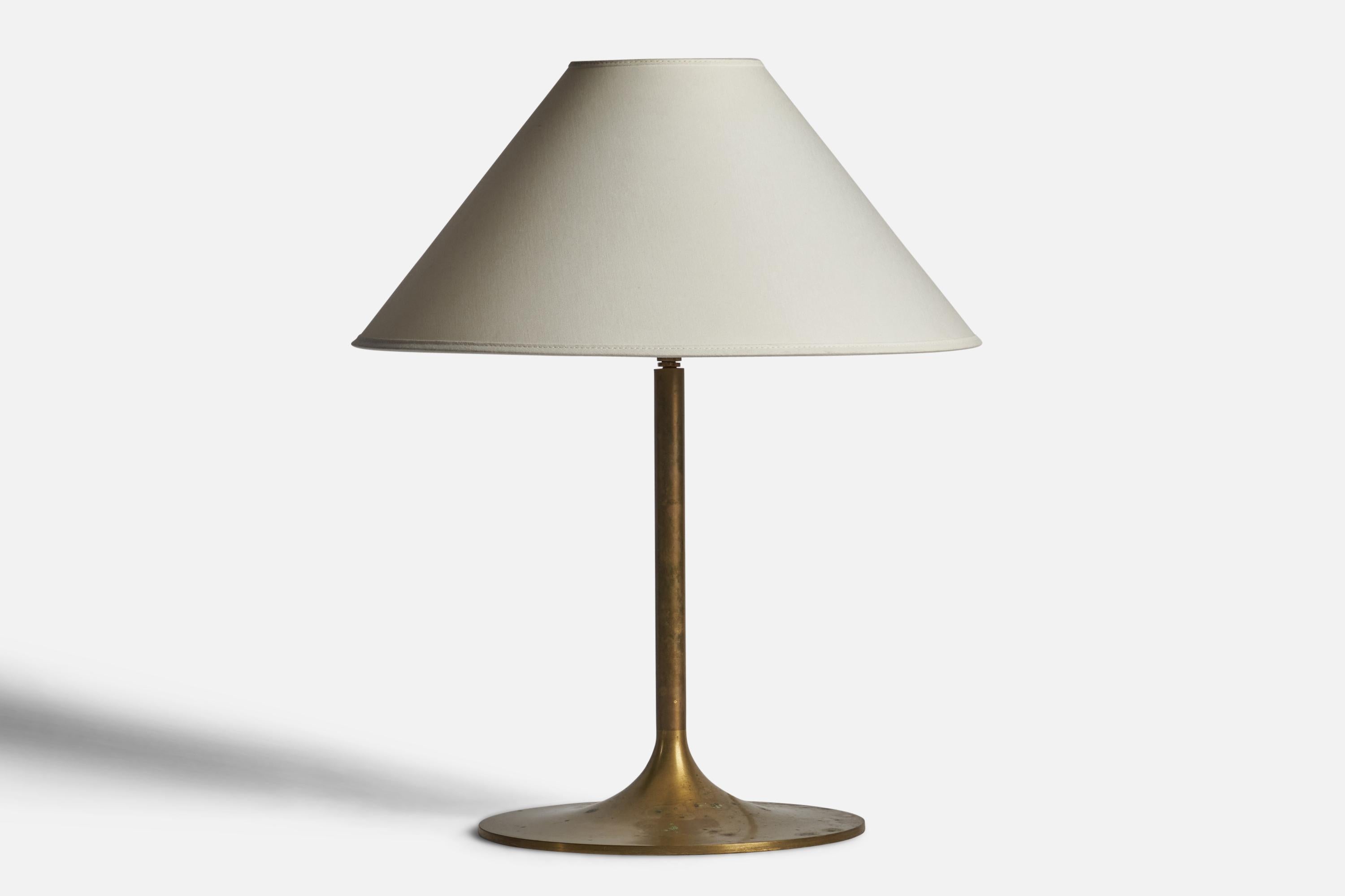 A brass table lamp designed and produced in Sweden, 1950s.

Dimensions of Lamp (inches): 15” H x 9.75” Diameter
Dimensions of Shade (inches): 4.75” Top Diameter x 16” Bottom Diameter x 9” H 
Dimensions of Lamp with Shade (inches): 19.5” H x 16”