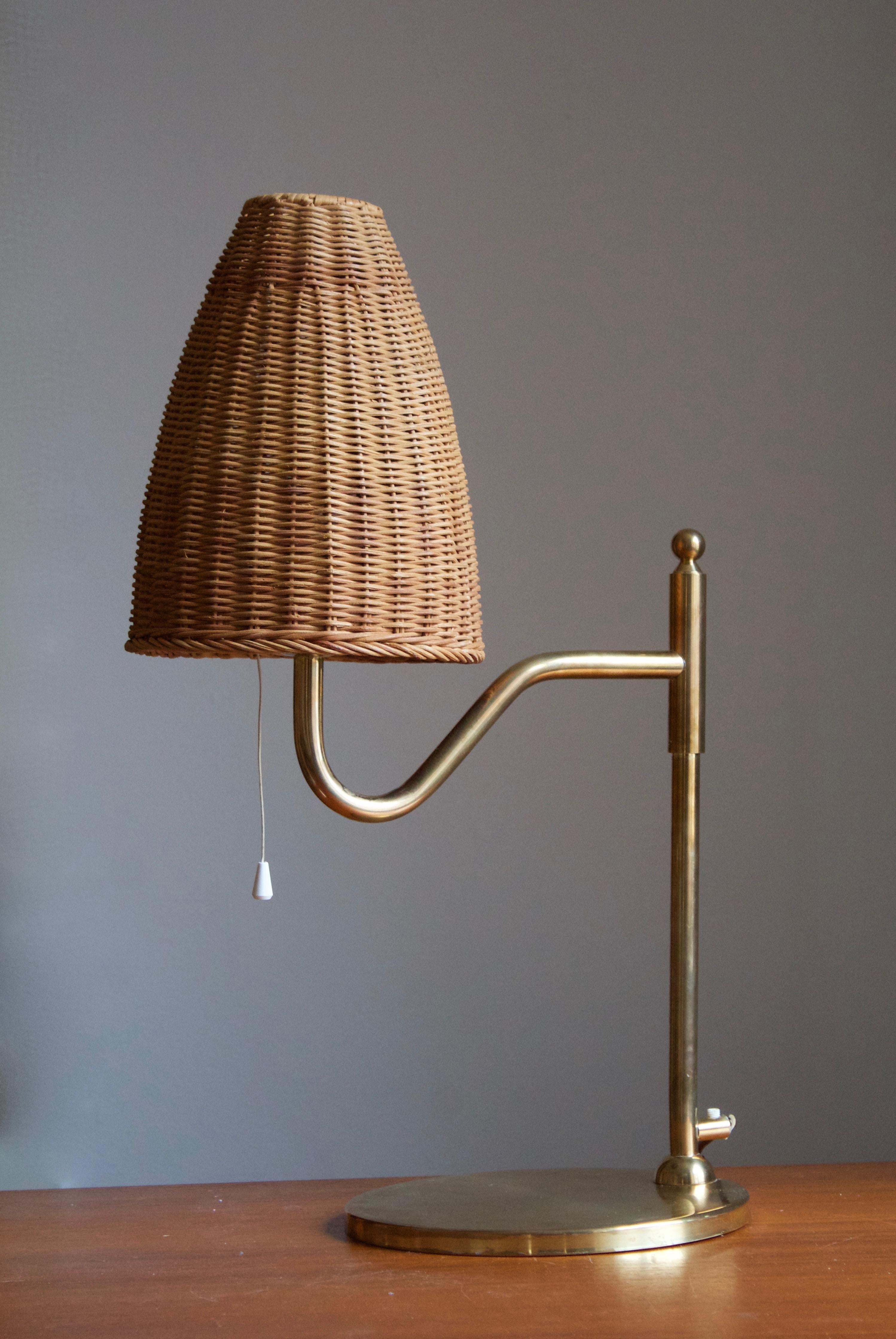 A table lamp produced in Sweden, c. 1960s.

Sold without lampshade. stated dimensions excluding lampshade, height includes socket. 

Other designers of the period include Paavo Tynell, Hans Agne Jacobsen, Josef Frank, and Serge Mouille.
  