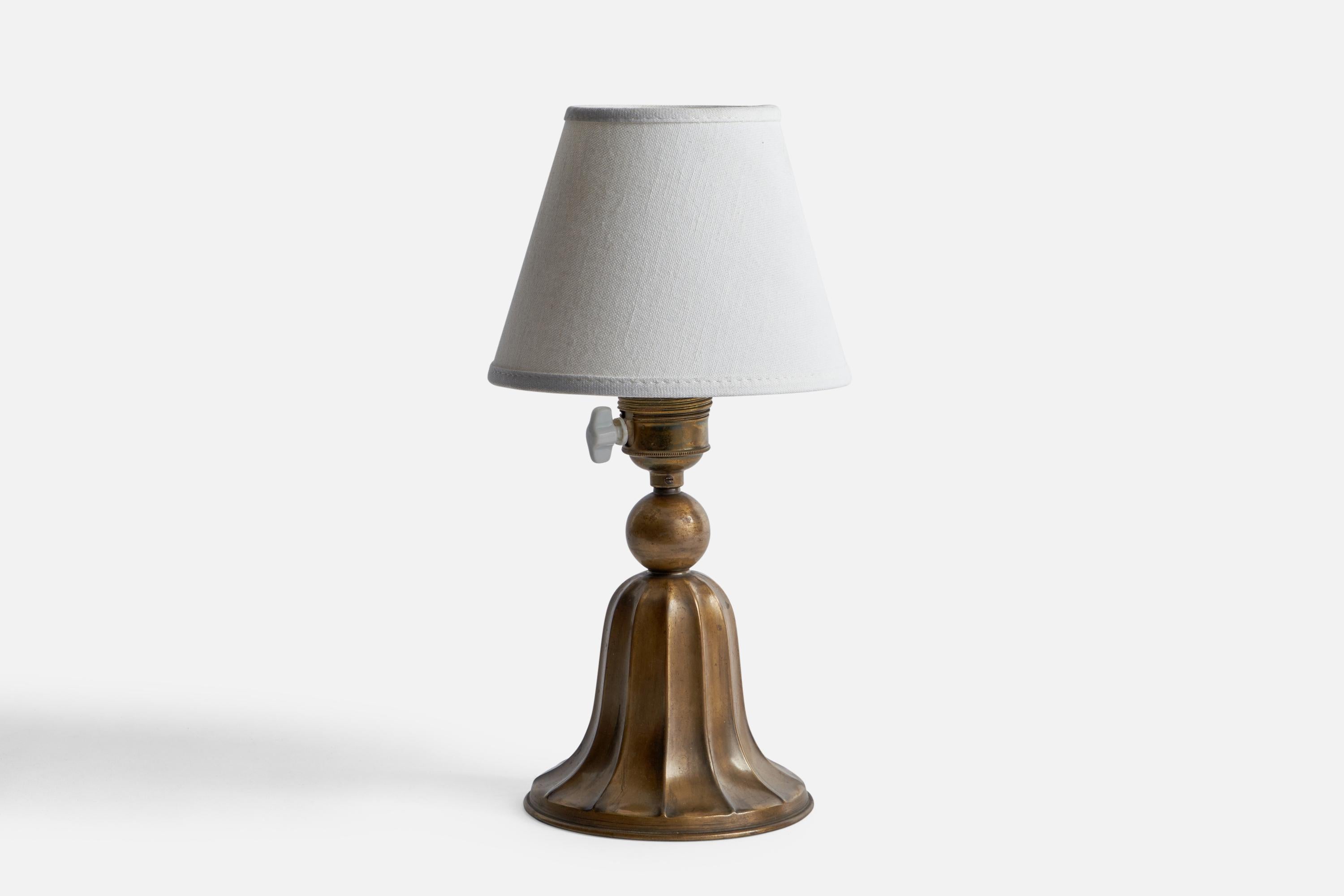 A small bronze table lamp designed and produced in Sweden, 1930s.

Dimensions of Lamp (inches): 8.25” H x 4.75” Diameter
Dimensions of Shade (inches): 3” Top Diameter x 5.75” Bottom Diameter x 4.5” H
Dimensions of Lamp with Shade (inches): 11” H x