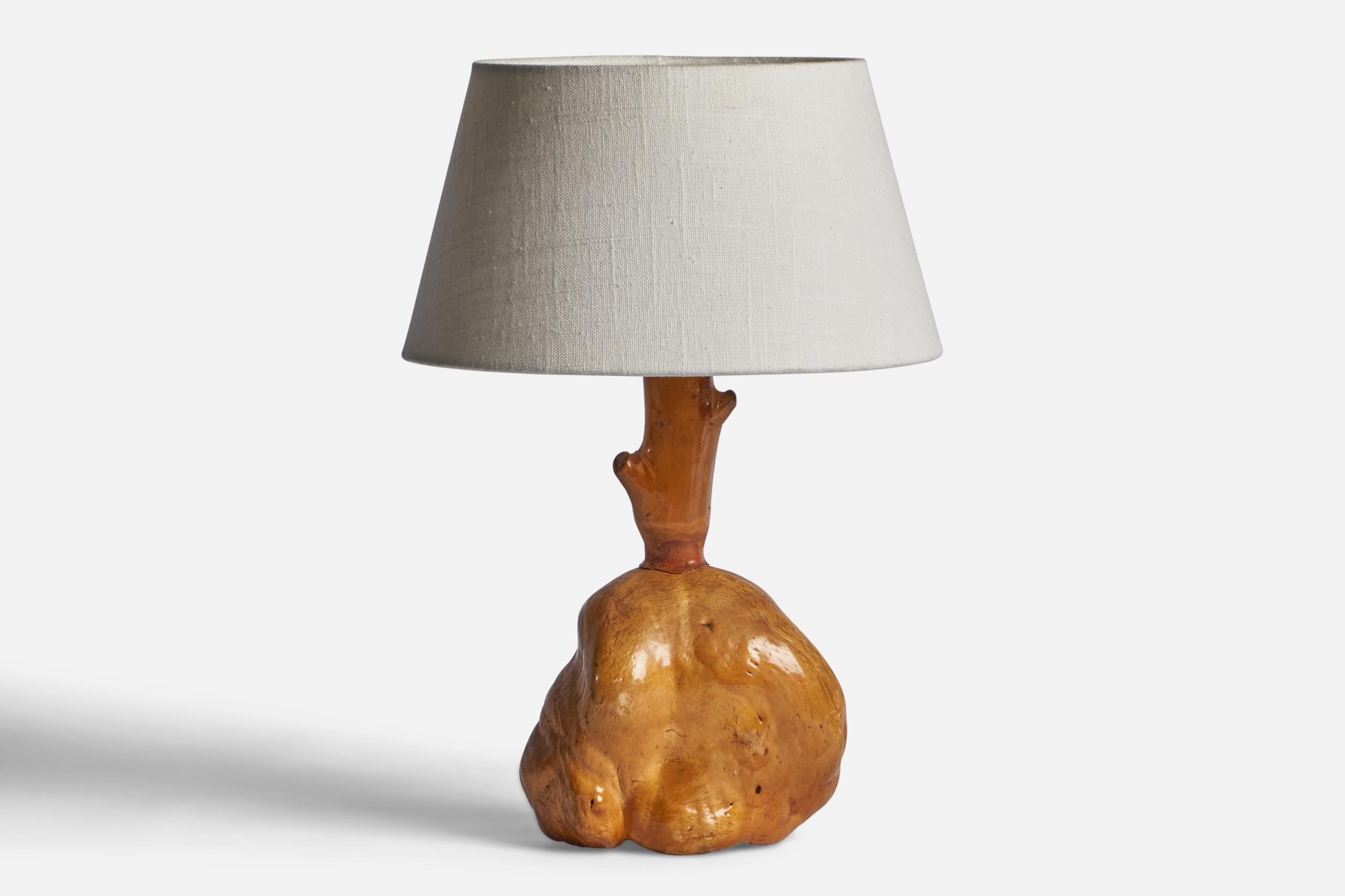 A freeform burl wood table lamp designed and produced in Sweden, c. 1960s.

Dimensions of Lamp (inches): 11.55” H x 6.25” Diameter
Dimensions of Shade (inches): 7” Top Diameter x 10” Bottom Diameter x 5.5” H 
Dimensions of Lamp with Shade (inches):