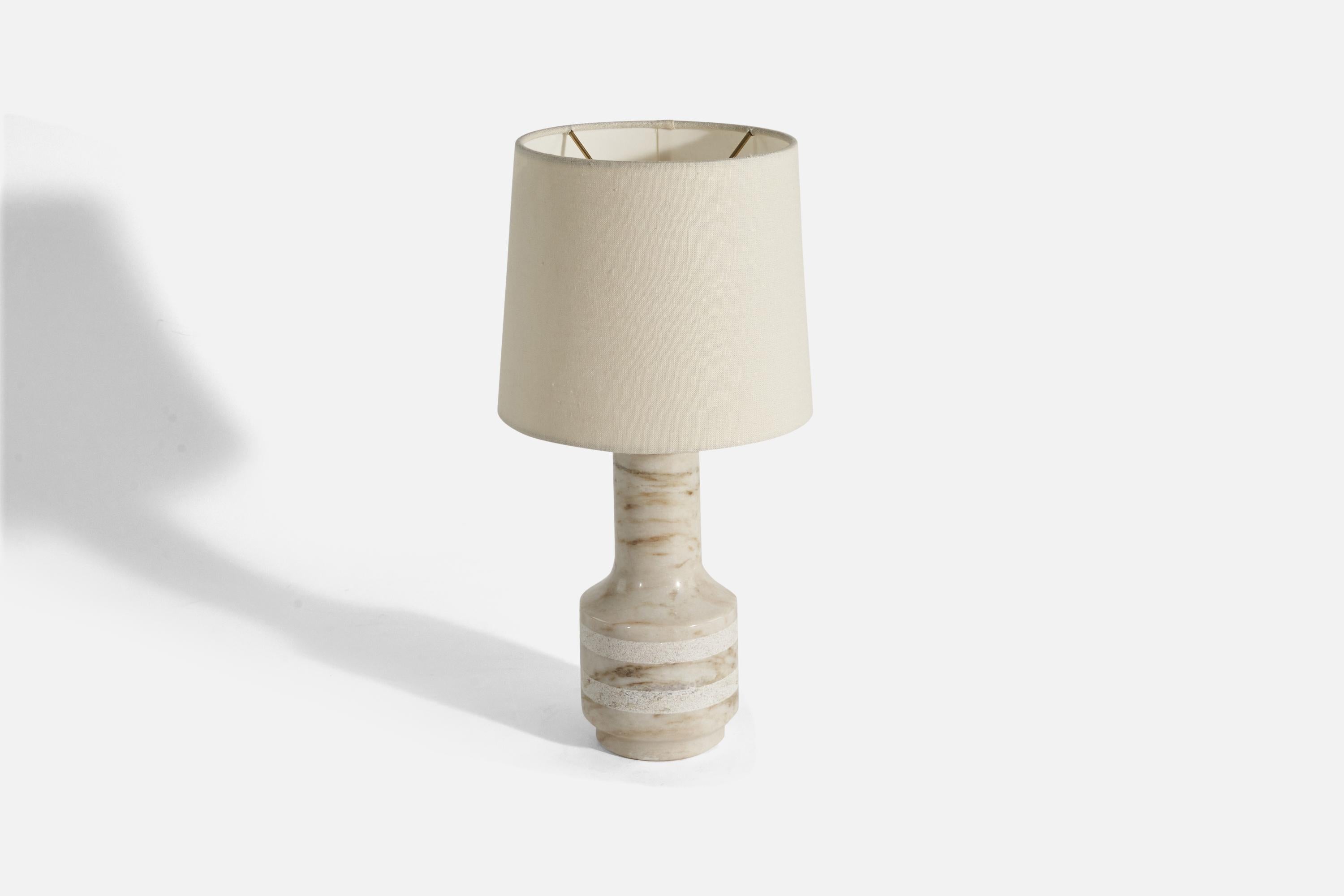 A Carrara marble table lamp designed and produced in Sweden, 1970s. 

Sold without Lampshade(s).
Dimensions of Lamp (inches) : 12.43 x 4.24 x 4.24 (Height x Width x Depth)
Dimensions of Shade (inches) : 7 x 8 x 7 (Top Diameter x Bottom Diameter x