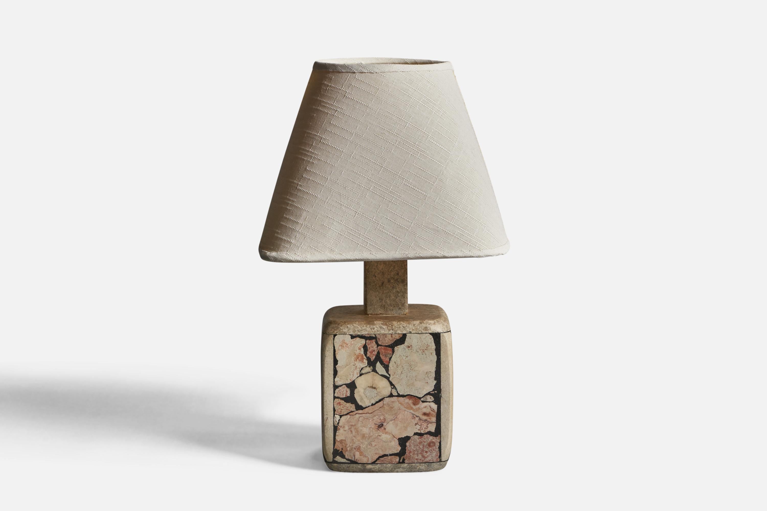 A fossil stone and white fabric table lamp, designed and produced in Gotland, Sweden, c. 1970s.

Overall Dimensions (inches): 12