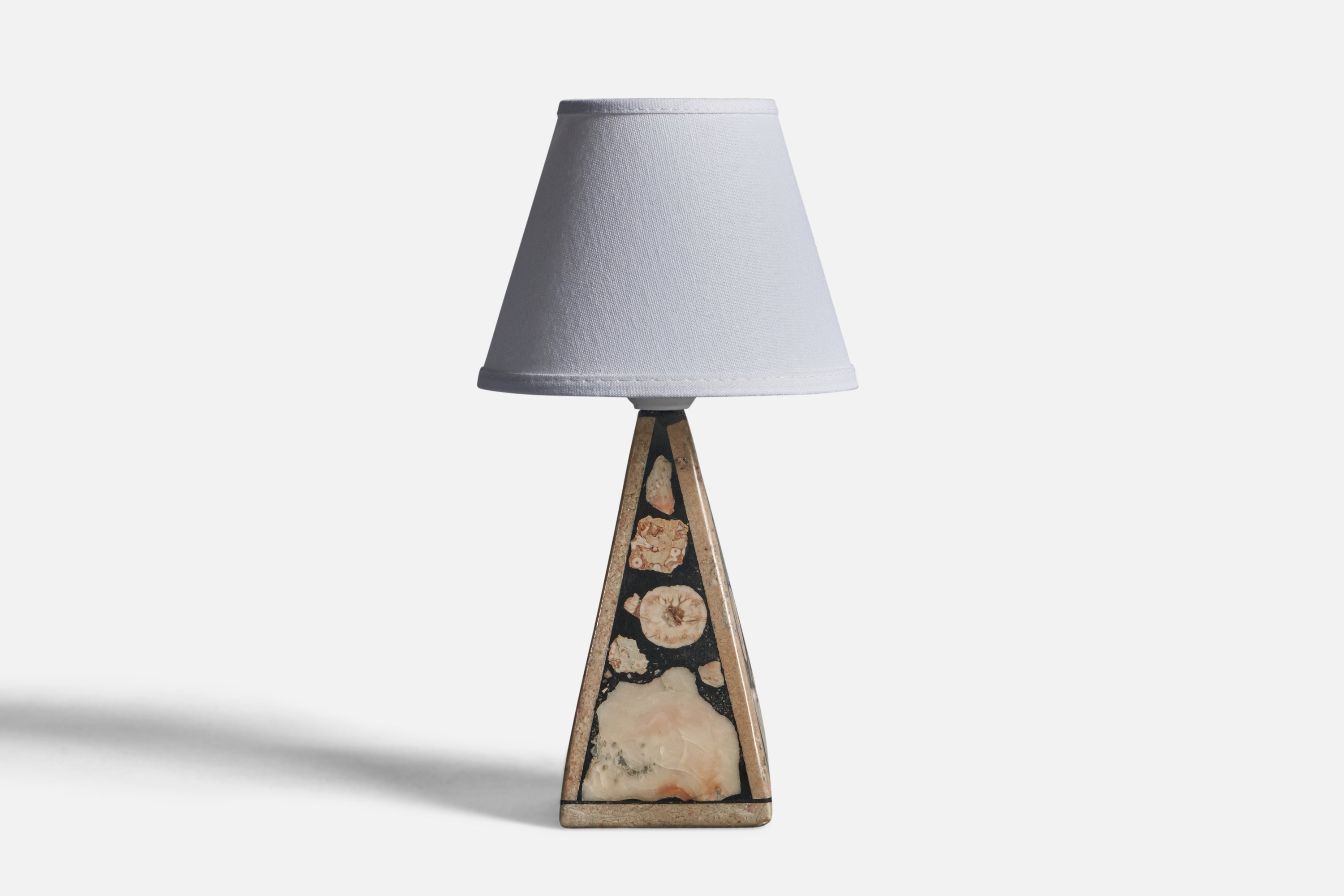 A fossil stone table lamp designed and produced in Gotland, Sweden, 1970s.

Dimensions of Lamp (inches): 8.5