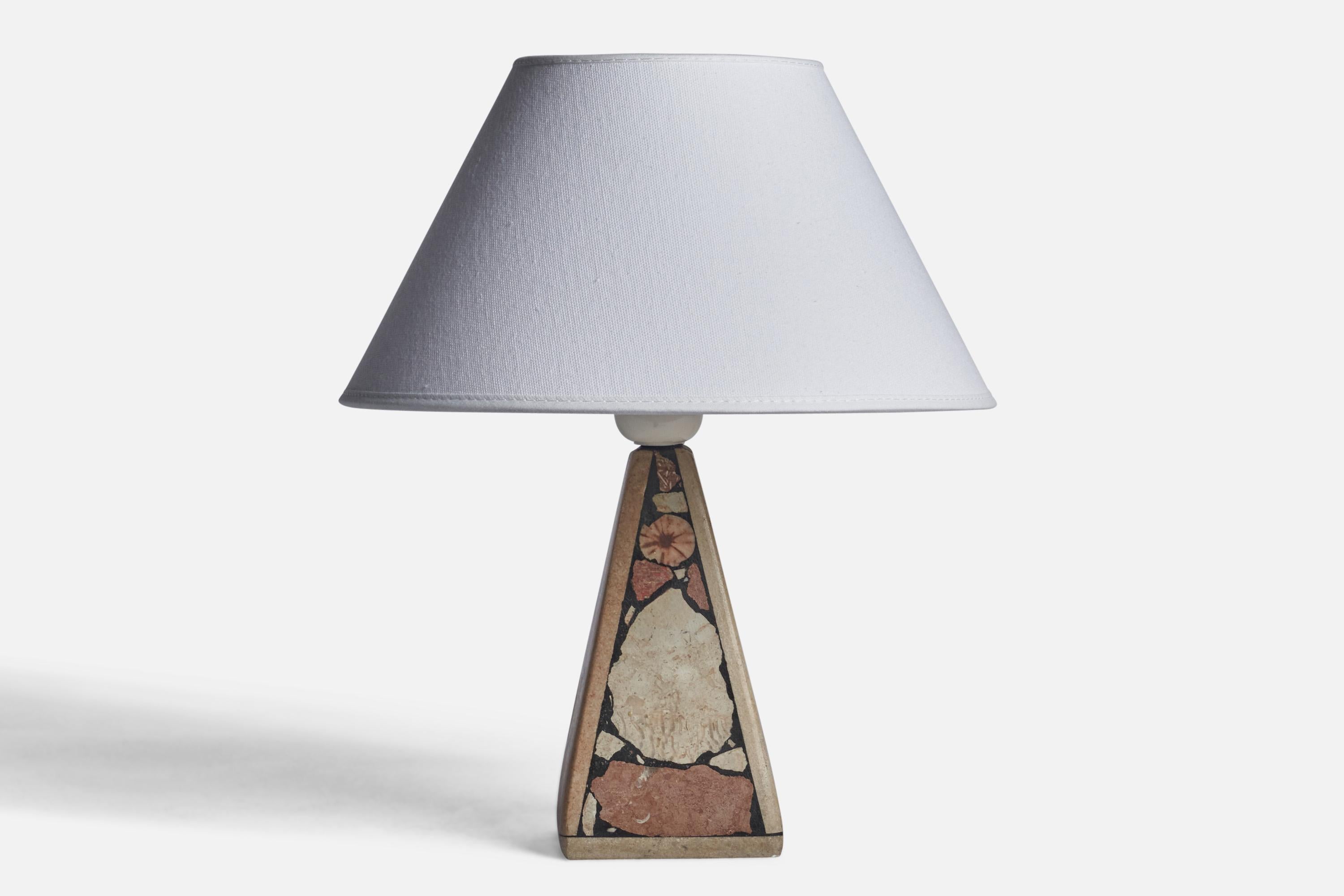 A fossil stone table lamp designed and produced in Gotland, Sweden, c. 1970s.

Dimensions of Lamp (inches): 8.25” H x 3.45” Diameter
Dimensions of Shade (inches): 4” Top Diameter x 10” Bottom Diameter x 5.25” H 
Dimensions of Lamp with Shade
