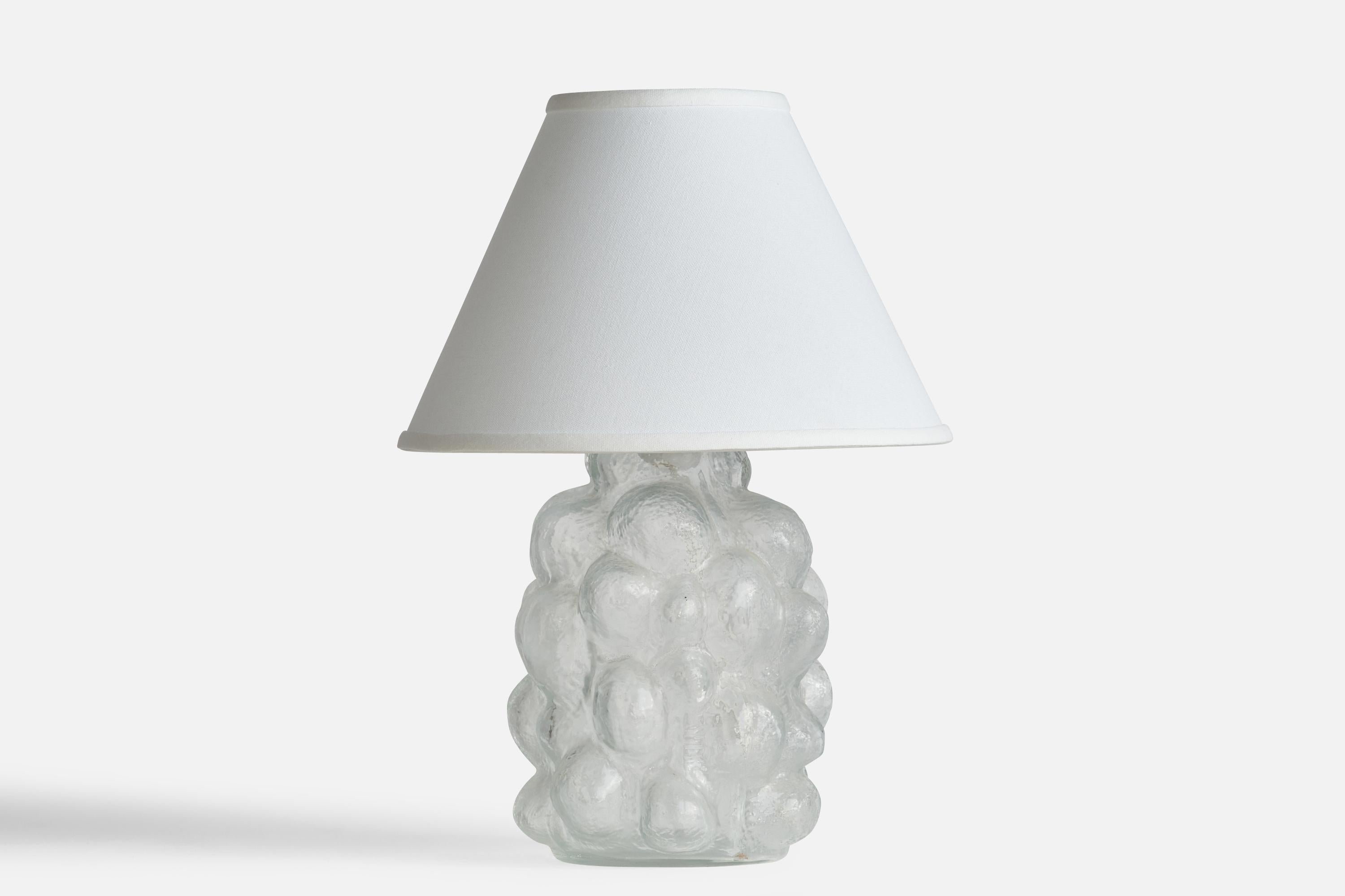 A glass table lamp designed and produced in Sweden, c. 1960s.

Dimensions of Lamp (inches): 11.4” H x 7” Diameter
Dimensions of Shade (inches): 5” Top Diameter x 12” Bottom Diameter x 8” H
Dimensions of Lamp with Shade (inches): 17.25” H x 12”