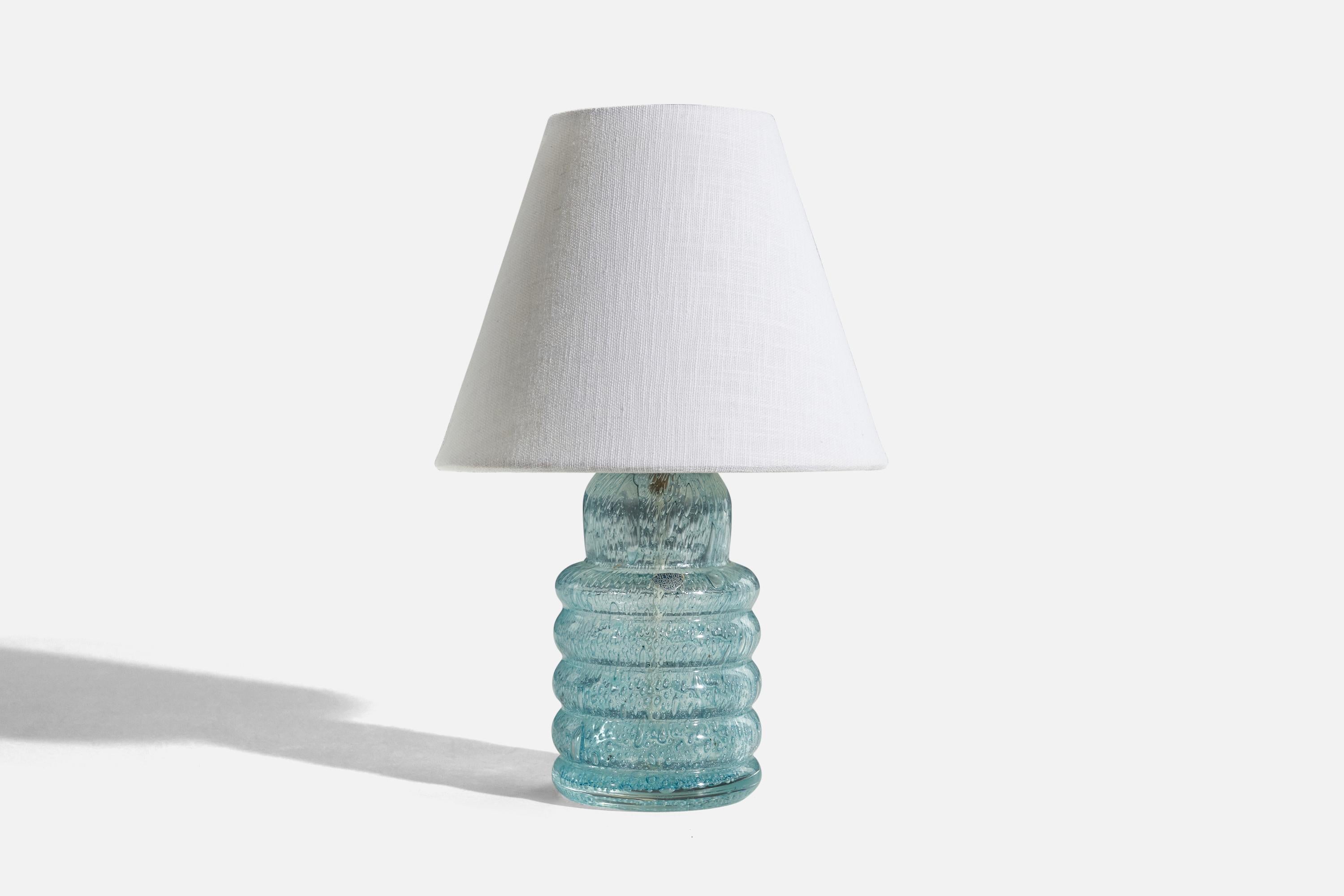 A glass table lamp designed and produced in Sweden, c. 1960s. 

Sold without lampshade. 
Dimensions of Lamp (inches) : 9.93 x 3.87 x 3.87 (H x W x D)
Dimensions of Shade (inches) : 4 x 8 x 6.5 (T x B x S)
Dimension of Lamp with Shade (inches) :
