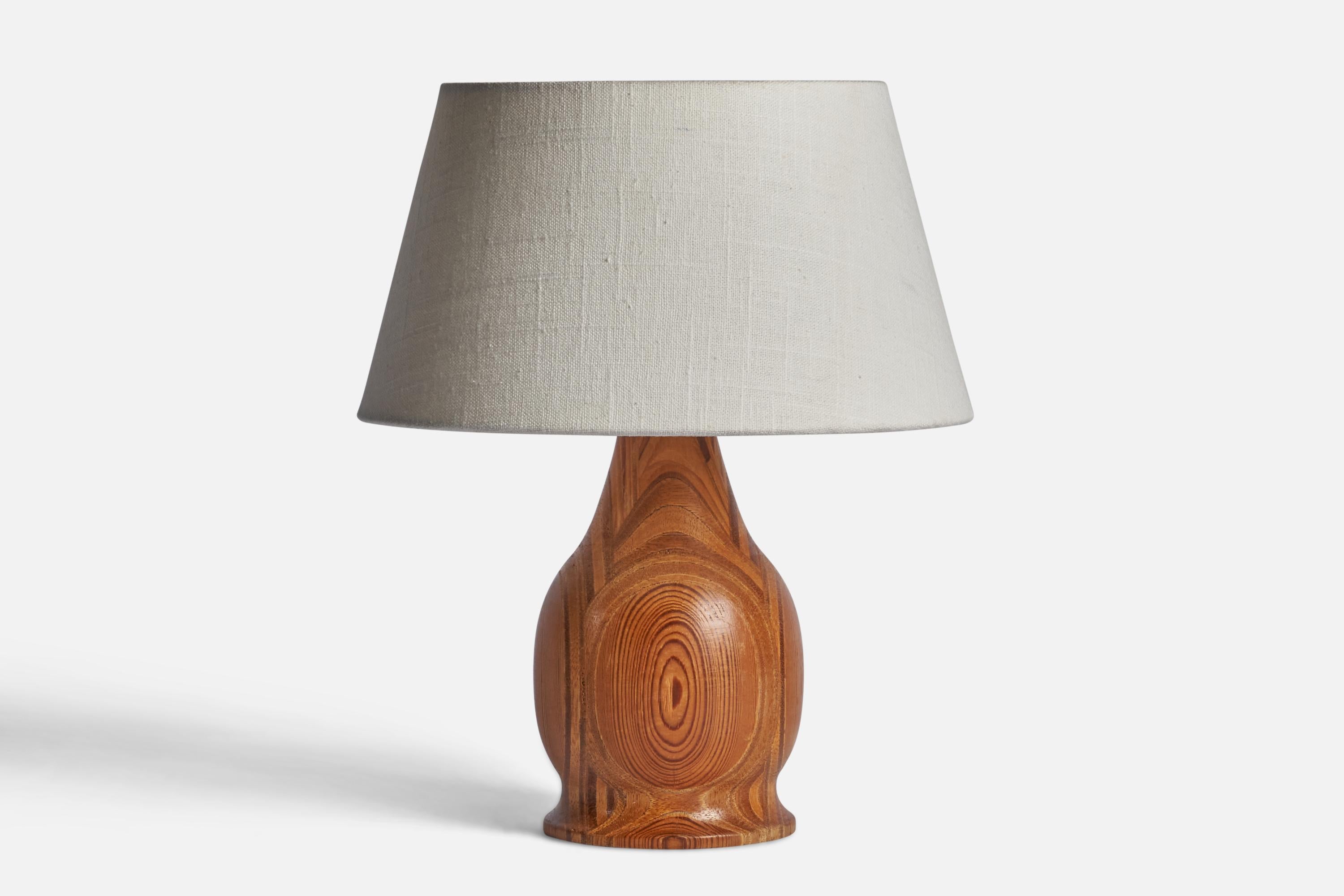 A laminated pine table lamp designed and produced in Sweden, 1970s.

Dimensions of Lamp (inches): 9.25” H x 4.25