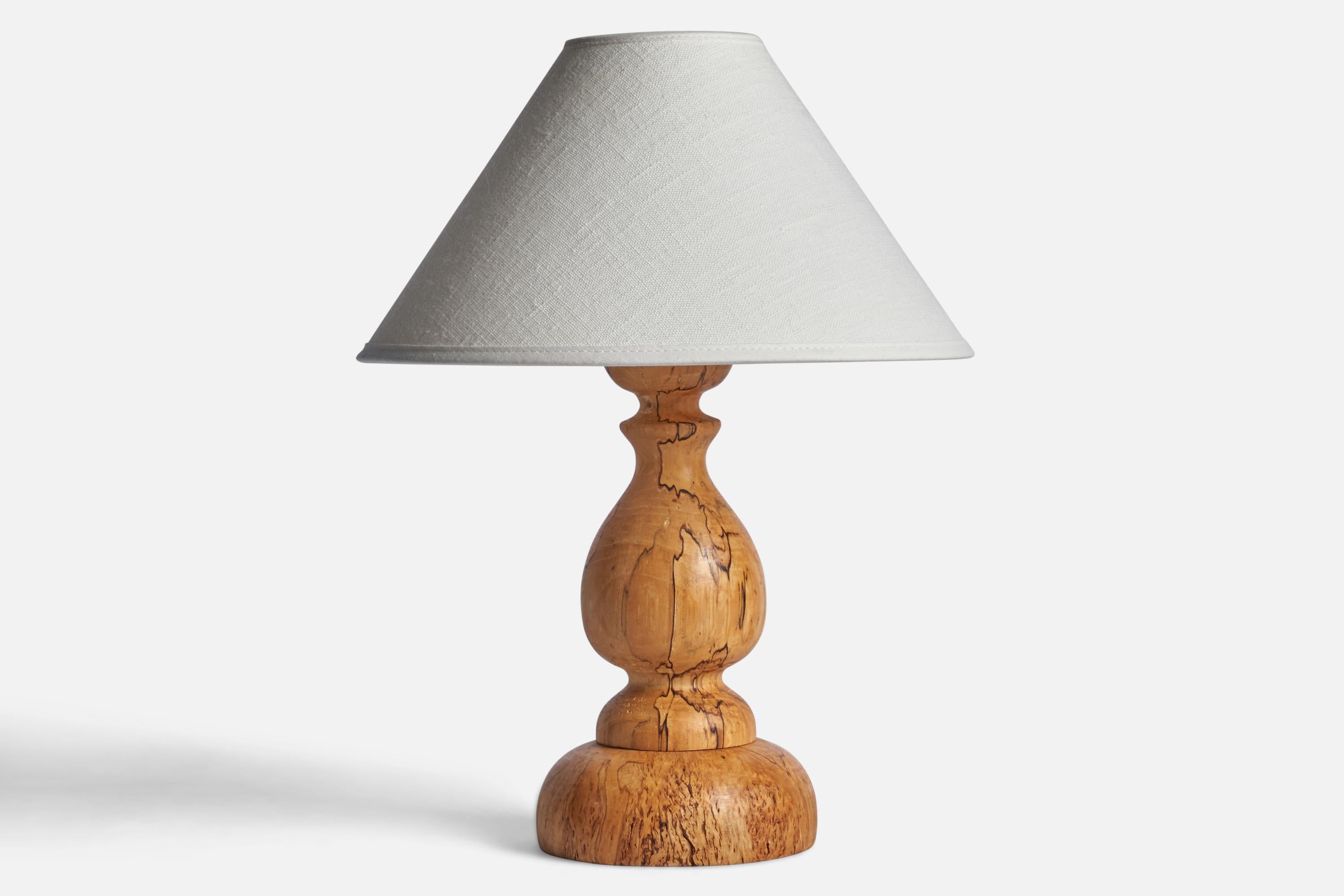 A masur birch table lamp designed and produced in Sweden, c. 1960s.

Dimensions of Lamp (inches): 10.15” H x 4.5” Diameter
Dimensions of Shade (inches): 2.5” Top Diameter x 10” Bottom Diameter x 5.5