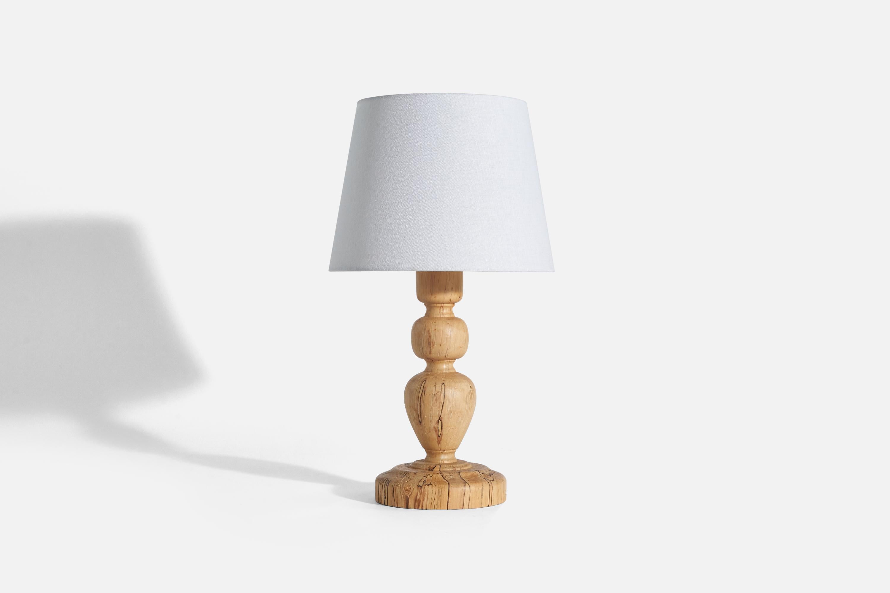 A masur birch table lamp designed and produced in Sweden, 1970s.

Sold without Lampshade(s)
Dimensions of lamp (inches) : 15 x 7 x 7 (height x width x depth)
Dimensions of shade (inches) : 9 x 12 x 9 (top diameter x bottom diameter x
