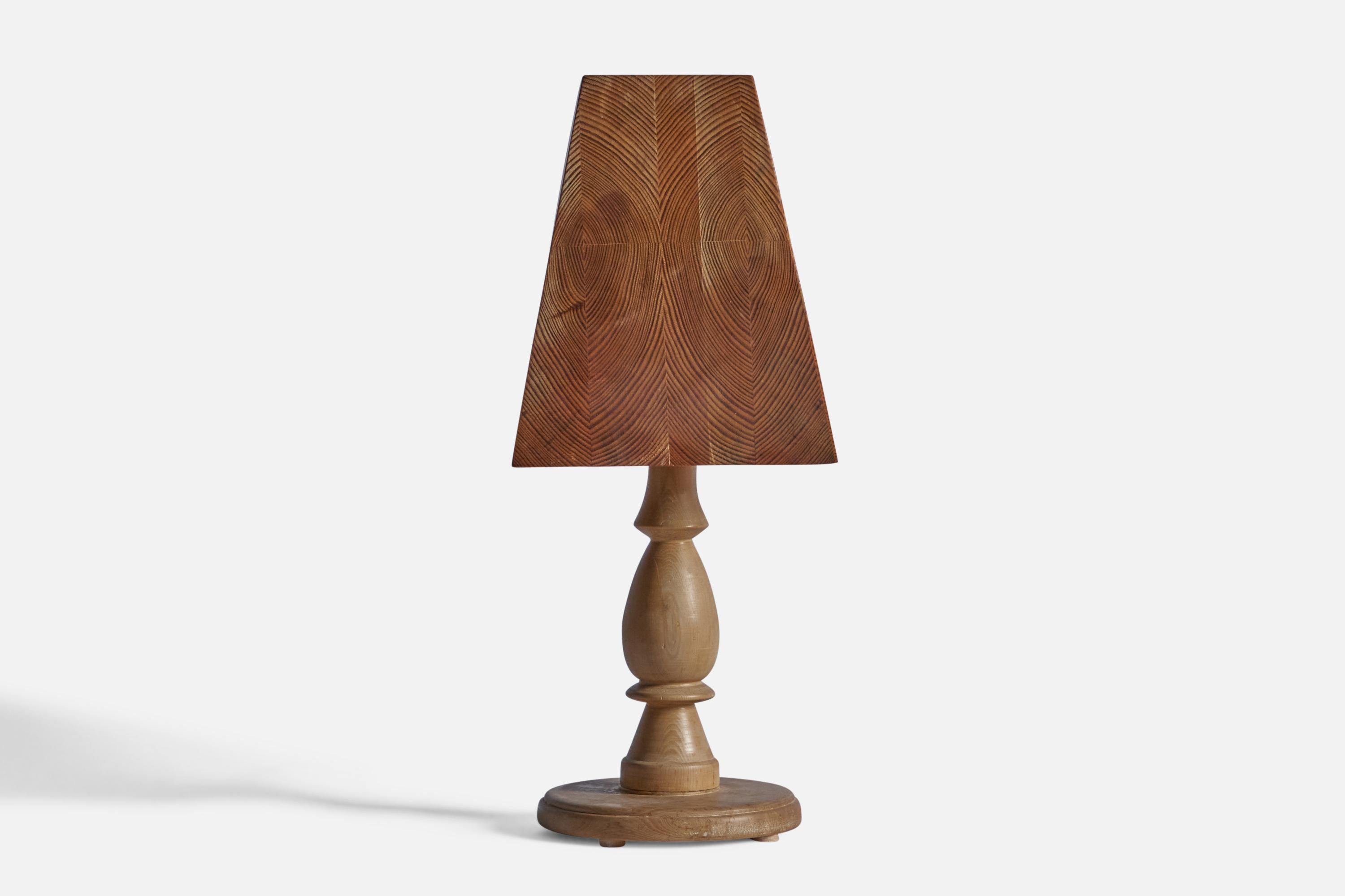 A pine and birch table lamp, designed and produced in Sweden, 1970s.