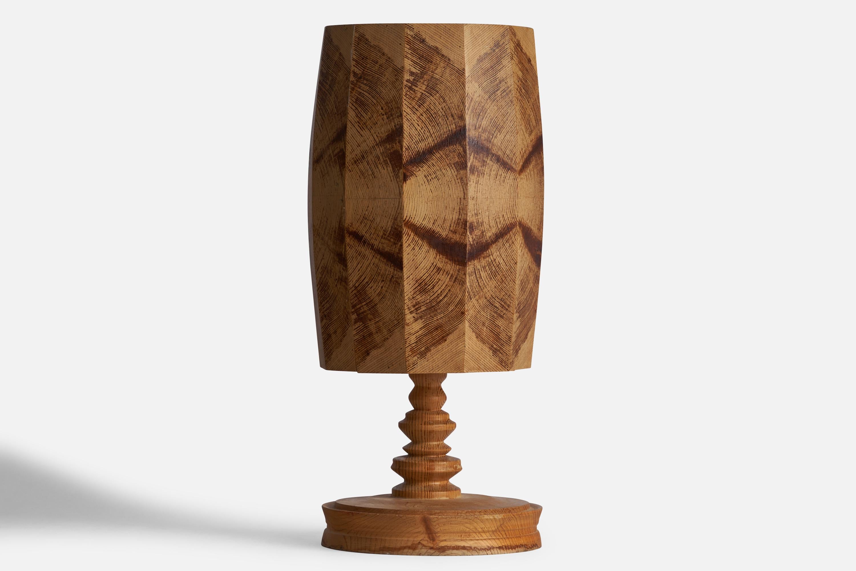A turned pine and salting table lamp designed and produced in Sweden, 1970s.

Overall Dimensions (inches): 17.25” H x 7.5” diameter 
Bulb Specifications: E-14 Bulb
Number of Sockets: 1
All lighting will be converted for US usage. We is unable to