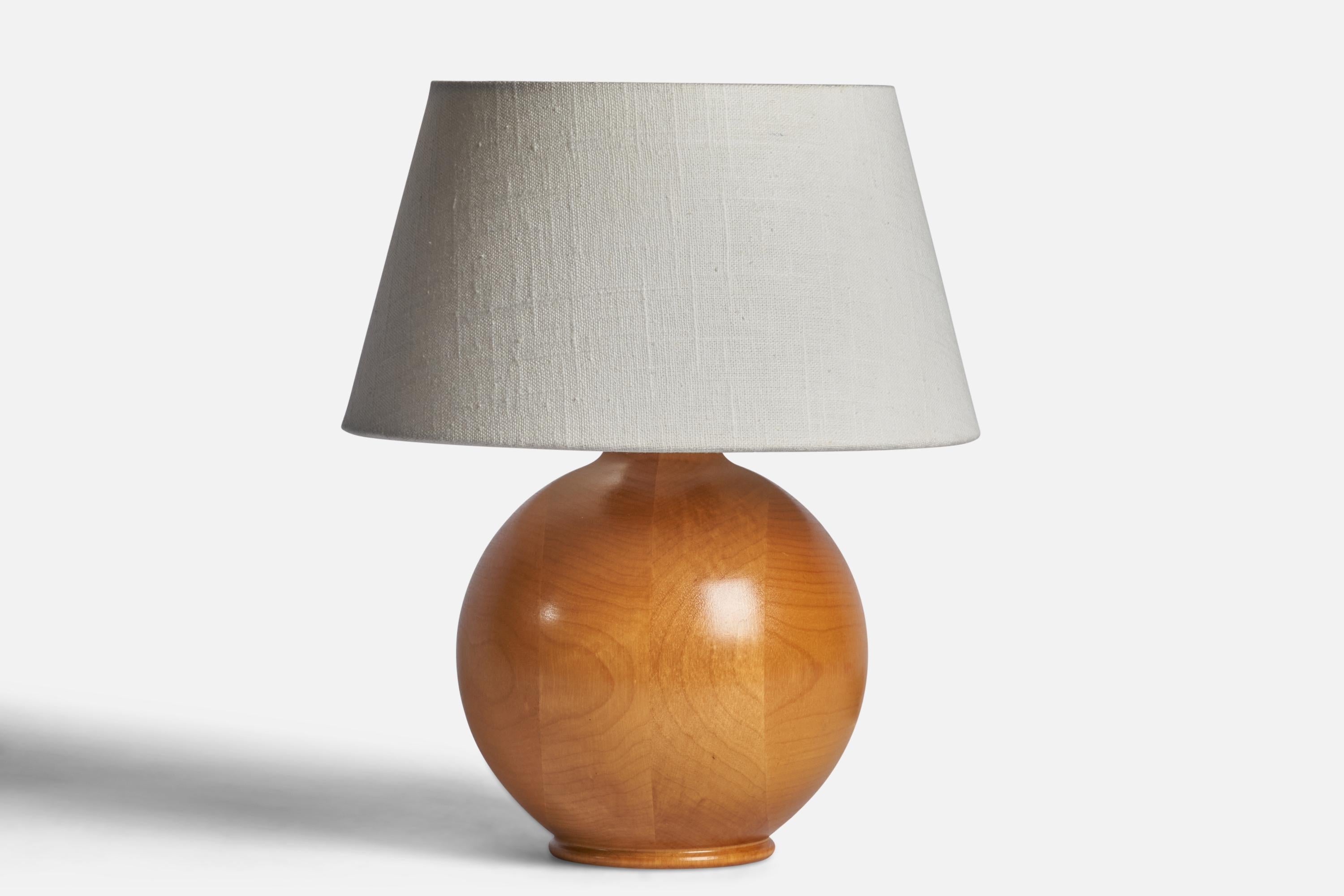 A pine table lamp designed and produced in Sweden, c. 1960s.

Dimensions of Lamp (inches): 9” H x 6.25” Diameter
Dimensions of Shade (inches): 7” Top Diameter x 10” Bottom Diameter x 5.5” H 
Dimensions of Lamp with Shade (inches): 12.25” H x