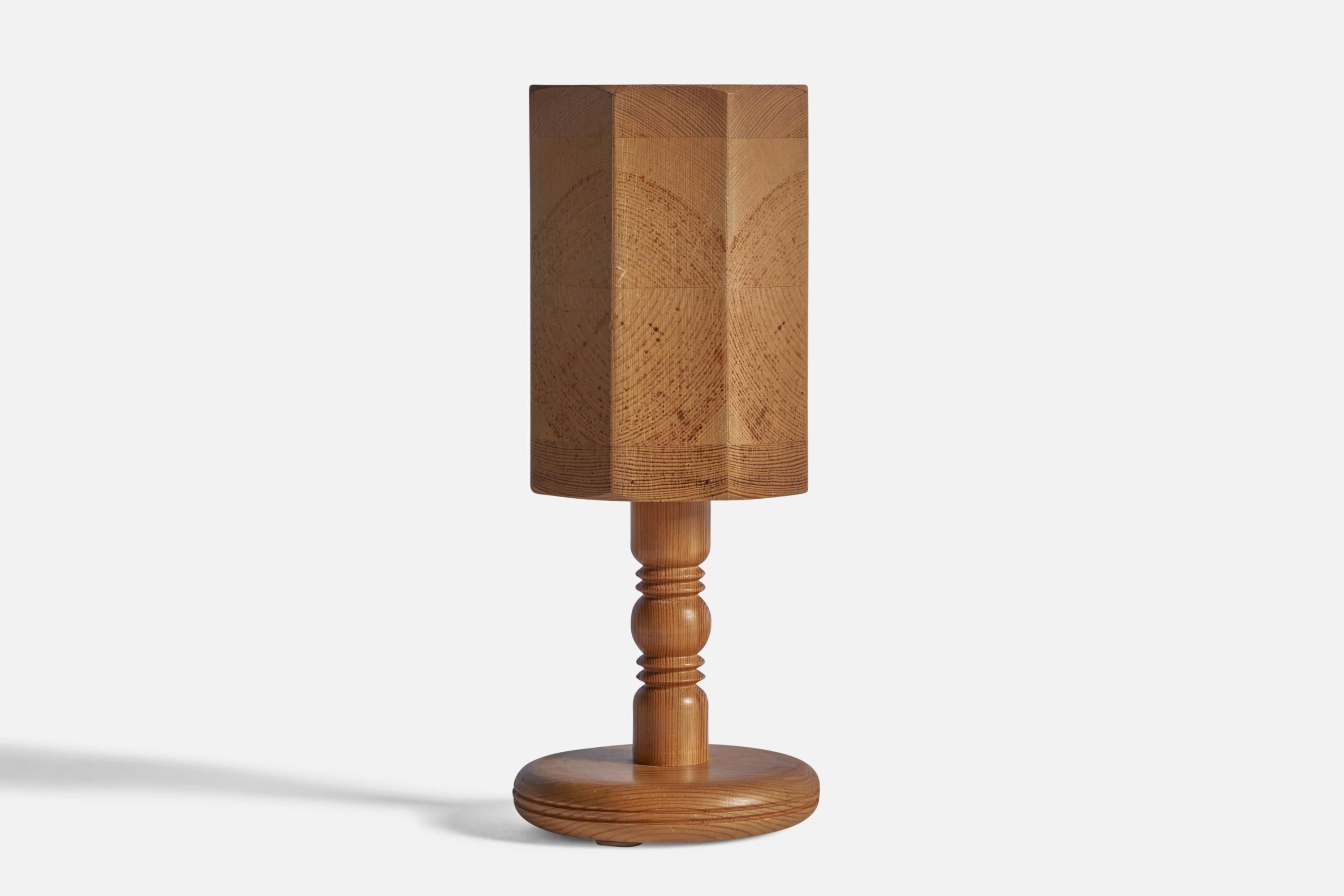 A pine table lamp, designed and produced in Sweden, 1970s.