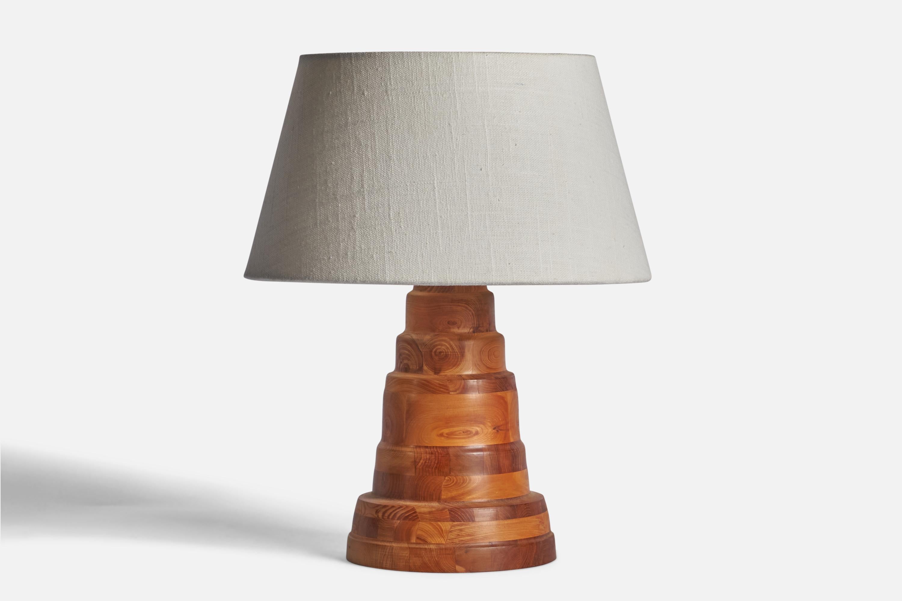A pine table lamp designed and produced in Sweden, c. 1970s.

Dimensions of Lamp (inches): 9.25