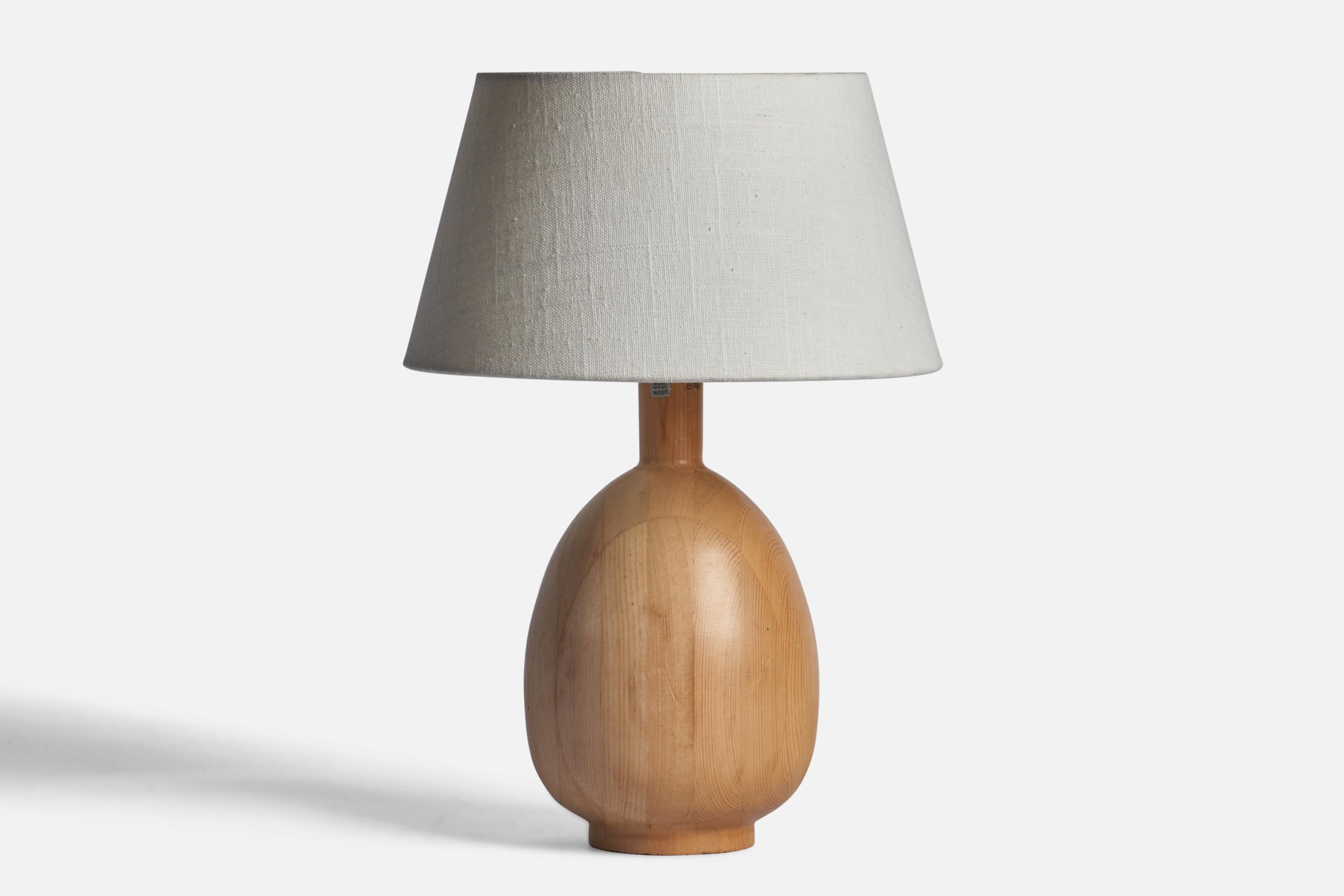A solid pine table lamp designed and produced in Sweden, 1970s.

Dimensions of Lamp (inches): 11.45