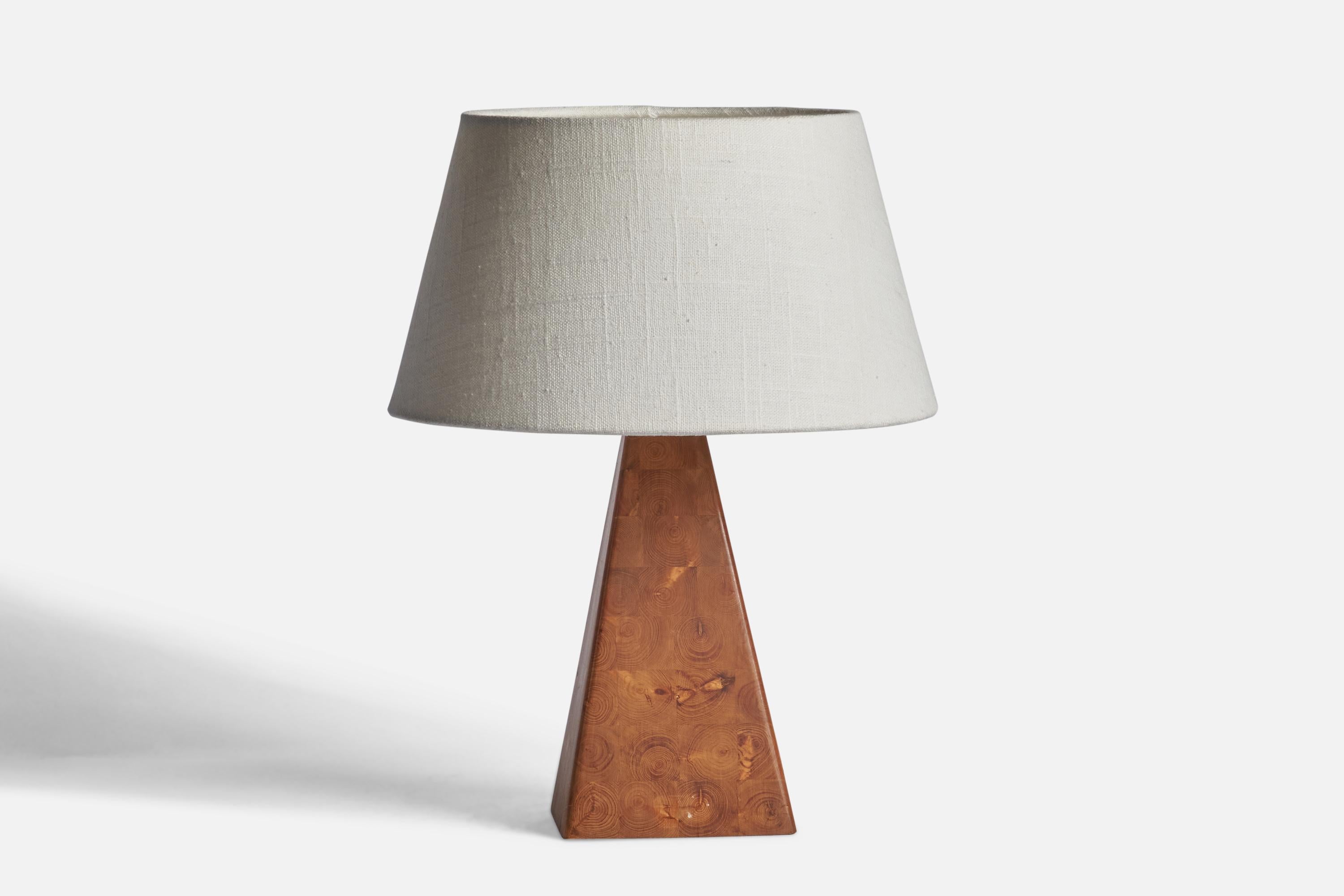 A pine table lamp designed and produced in Sweden, 1970s.

Dimensions of Lamp (inches): 10” H x 4.25” Diameter
Dimensions of Shade (inches): 7” Top Diameter x 10” Bottom Diameter x 5.5” H 
Dimensions of Lamp with Shade (inches): 13.25” H x 10”