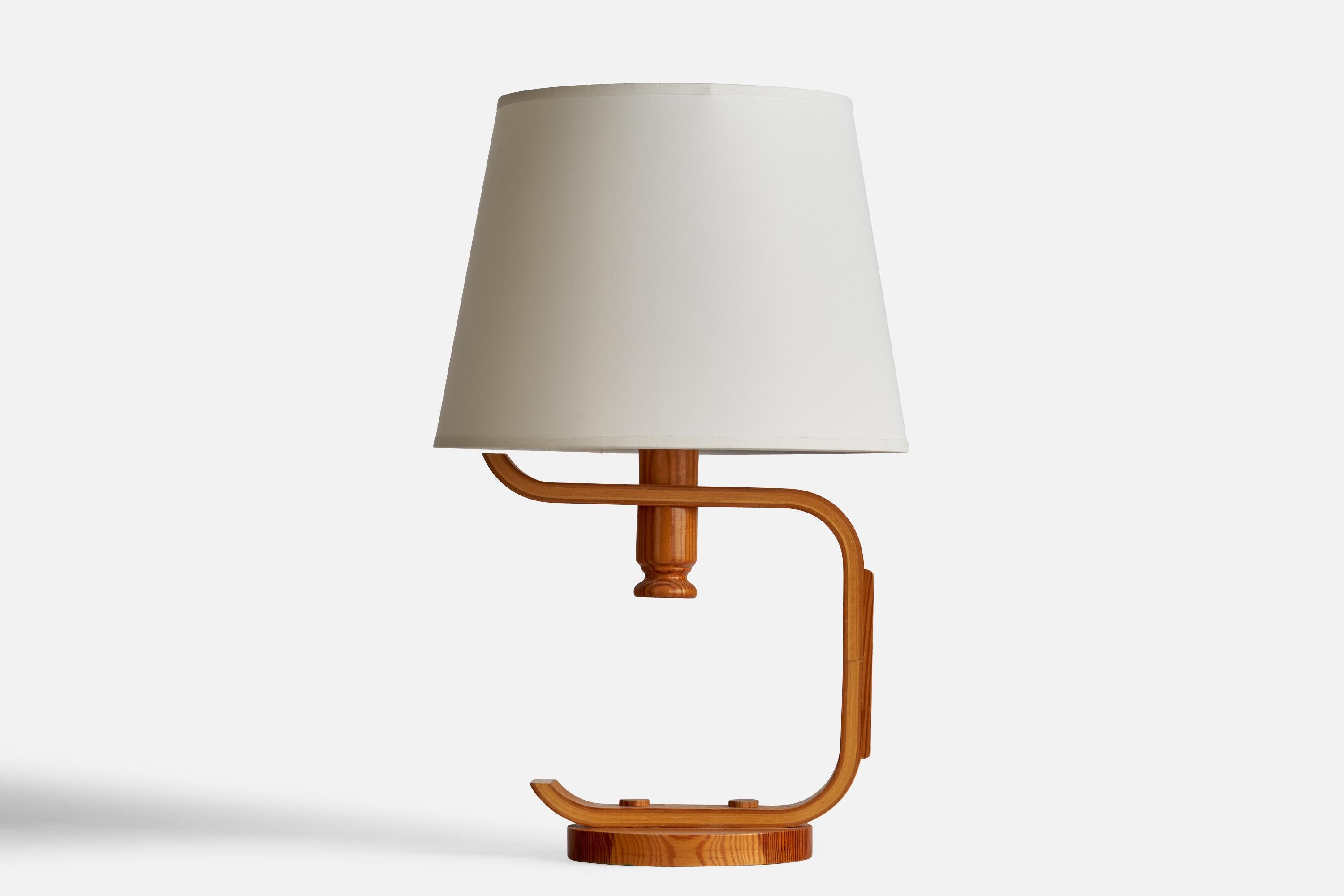 A moulded pine table lamp designed and produced in Sweden, 1970s.

Dimensions of Lamp (inches): 13.5” H x 10” Diameter
Dimensions of Shade (inches): 9” Top Diameter x 12” Bottom Diameter x 9” H
Dimensions of Lamp with Shade (inches): 19.25” H x 12”