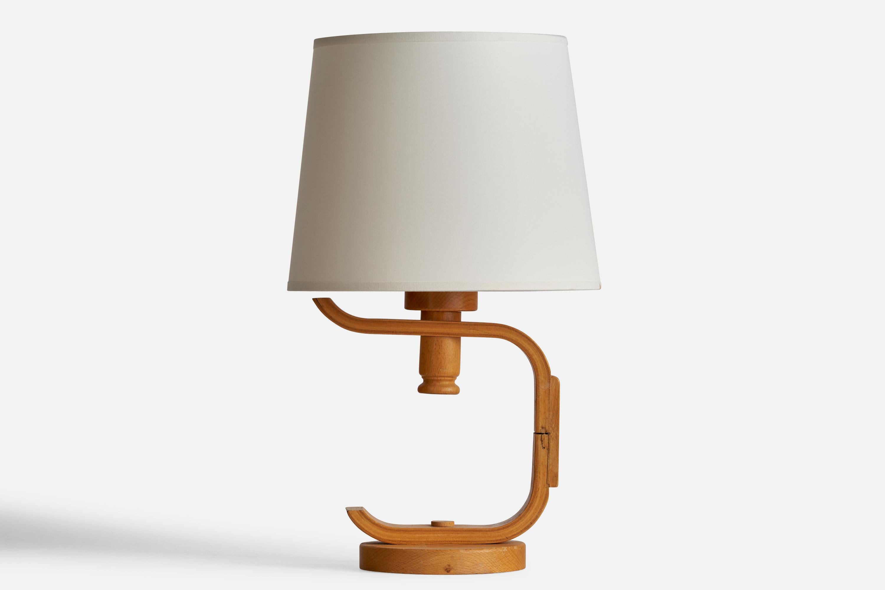 A moulded pine table lamp designed and produced in Sweden, 1970s.

Dimensions of Lamp (inches): 11” H x 8” Diameter
Dimensions of Shade (inches): 8”Top Diameter x 10” Bottom Diameter x 8” H
Dimensions of Lamp with Shade (inches): 17” H x 10”