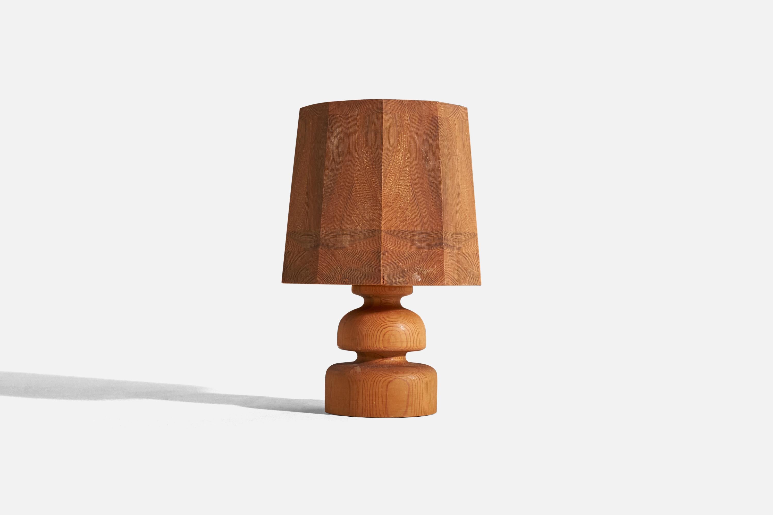 A pine table lamp designed and produced in Sweden, c. 1970s.

