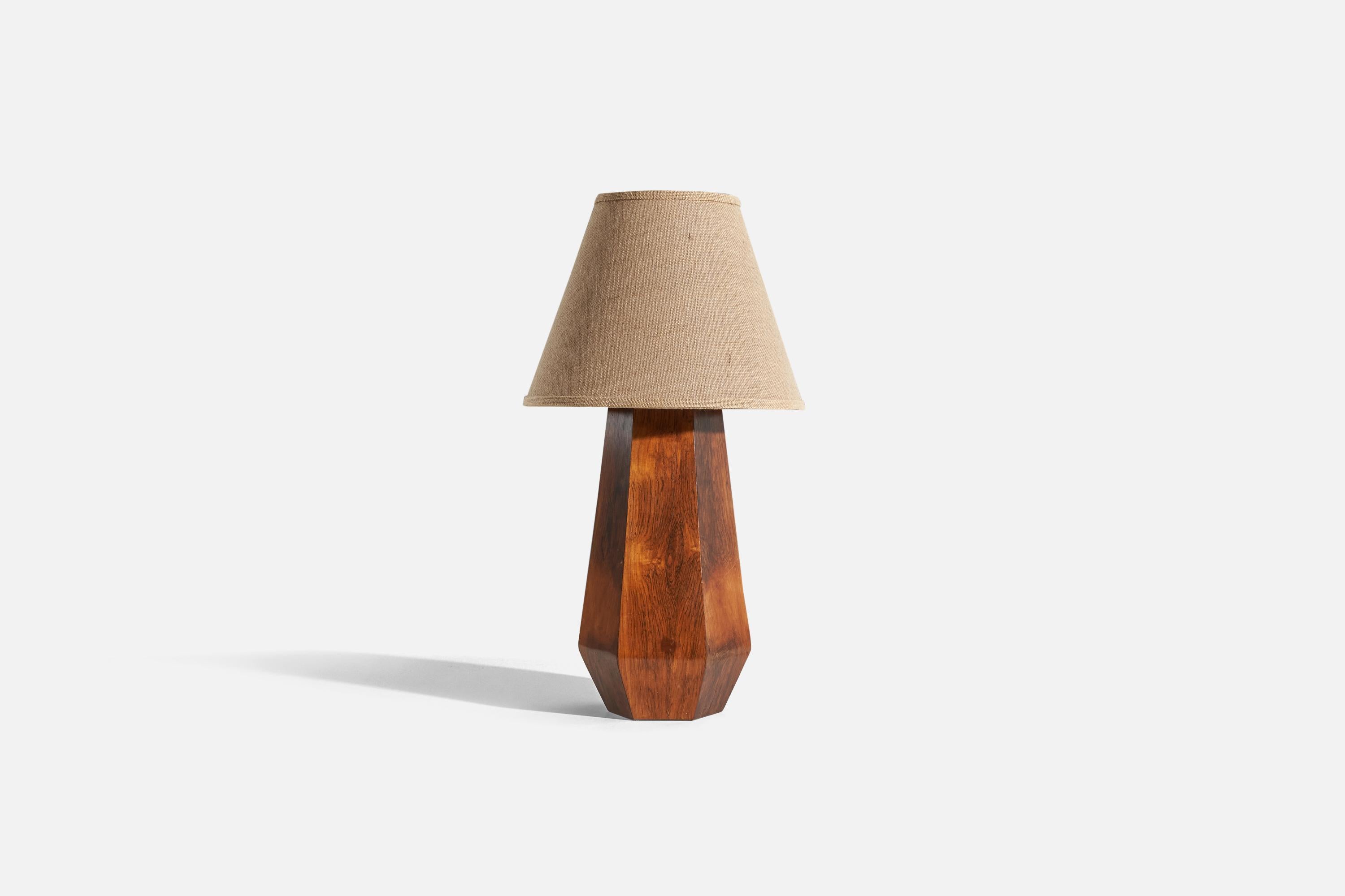 A rosewood table lamp designed and produced in Sweden, c. 1960s. 

Sold without lampshade. 
Dimensions of lamp (inches) : 19.9375 x 7.625 x 7.625 (H x W x D)
Dimensions of shade (inches) : 7.125 x 14.25 x 11.125 (T x B x S)
Dimension of lamp