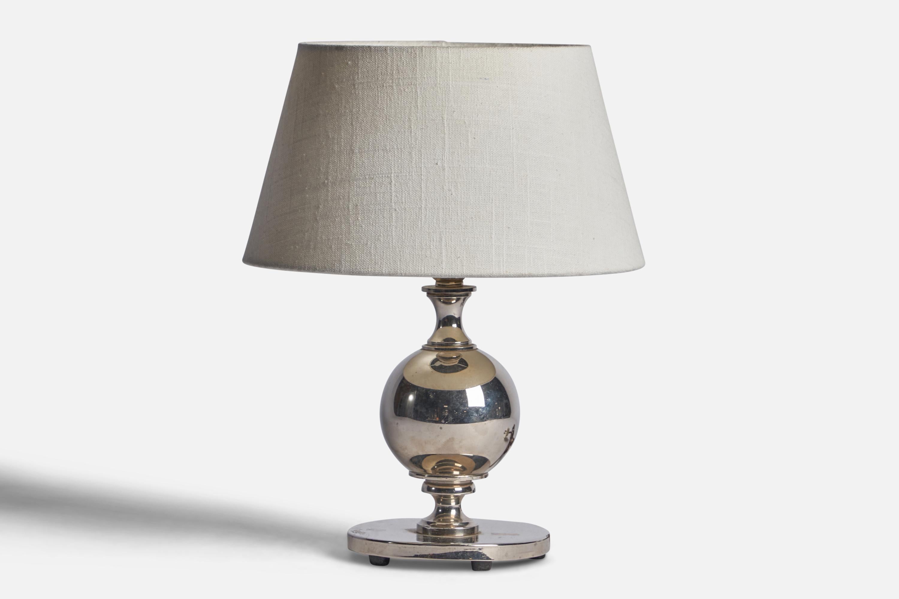 A silver plate table lamp designed and produced in Sweden, c. 1930s.

Dimensions of Lamp (inches): 10” H x 5” Diameter
Dimensions of Shade (inches): 7” Top Diameter x 10” Bottom Diameter x 5.5” H 
Dimensions of Lamp with Shade (inches): 13” H x 10”