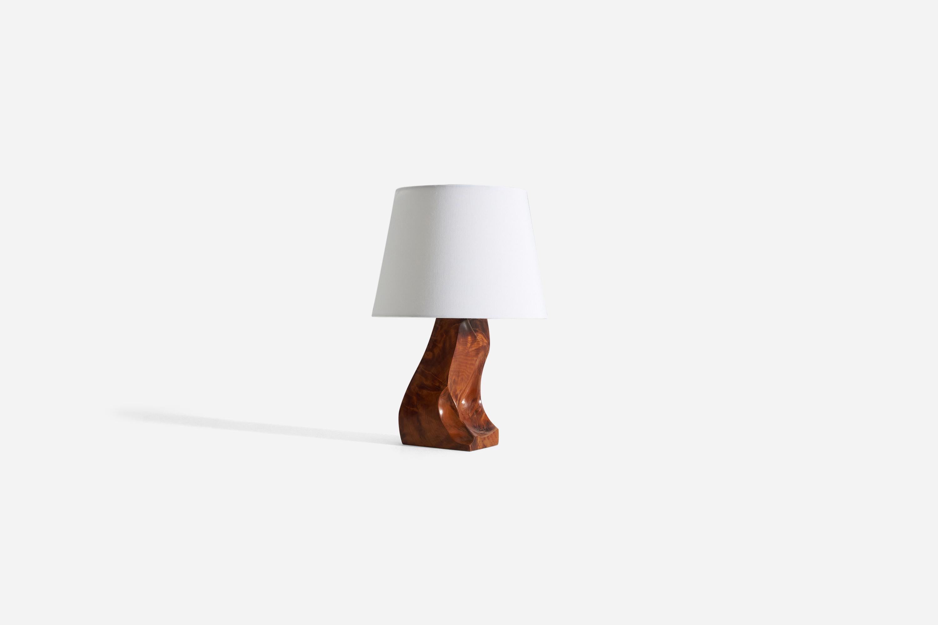 A freeform wooden table lamp. Designed and produced in Sweden, 1970s.

Sold without lampshade. Dimensions in listing exclude shade.
For reference:
Dimensions of lamp with shade H 17.5” / W 12”
Dimensions of shade- top of shade diameter 9” /