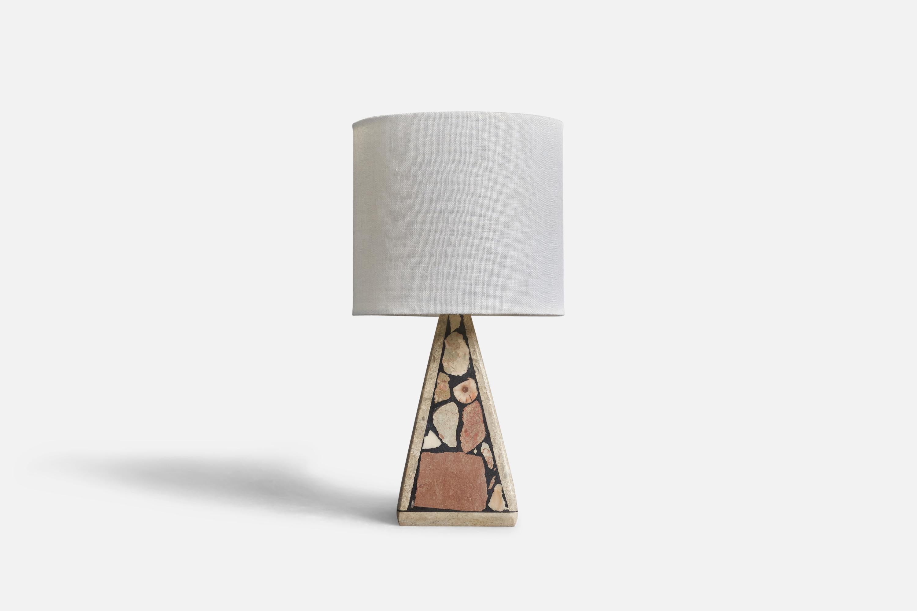 A fossil stone table lamp designed and produced by a Swedish Designer, Sweden, 1970s.

Dimensions of lamp (inches) : 8.2 x 3.4 x 3.4 (Height x Width x Depth)
Dimensions of lampshade (inches) : 6 x 6 x 5.5 (Top Diameter x Bottom Diameter x
