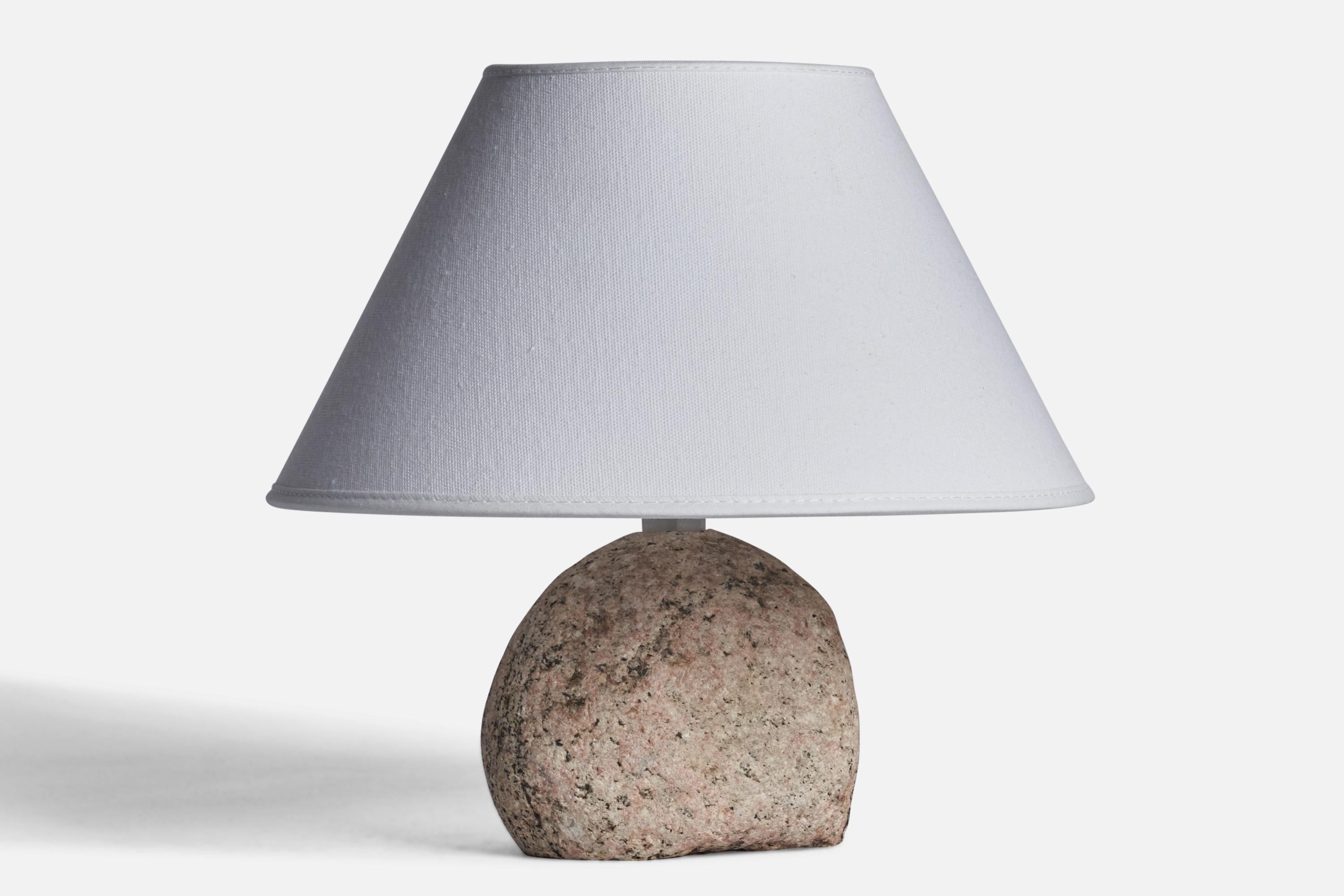 A stone table lamp designed and produced in Sweden, c. 1970s.

Dimensions of Lamp (inches): 6.25” H x 4.35” W x 3.25” W
Dimensions of Shade (inches): 7” Top Diameter x 10” Bottom Diameter x 5.5” H 
Dimensions of Lamp with Shade (inches): 9.25” H x