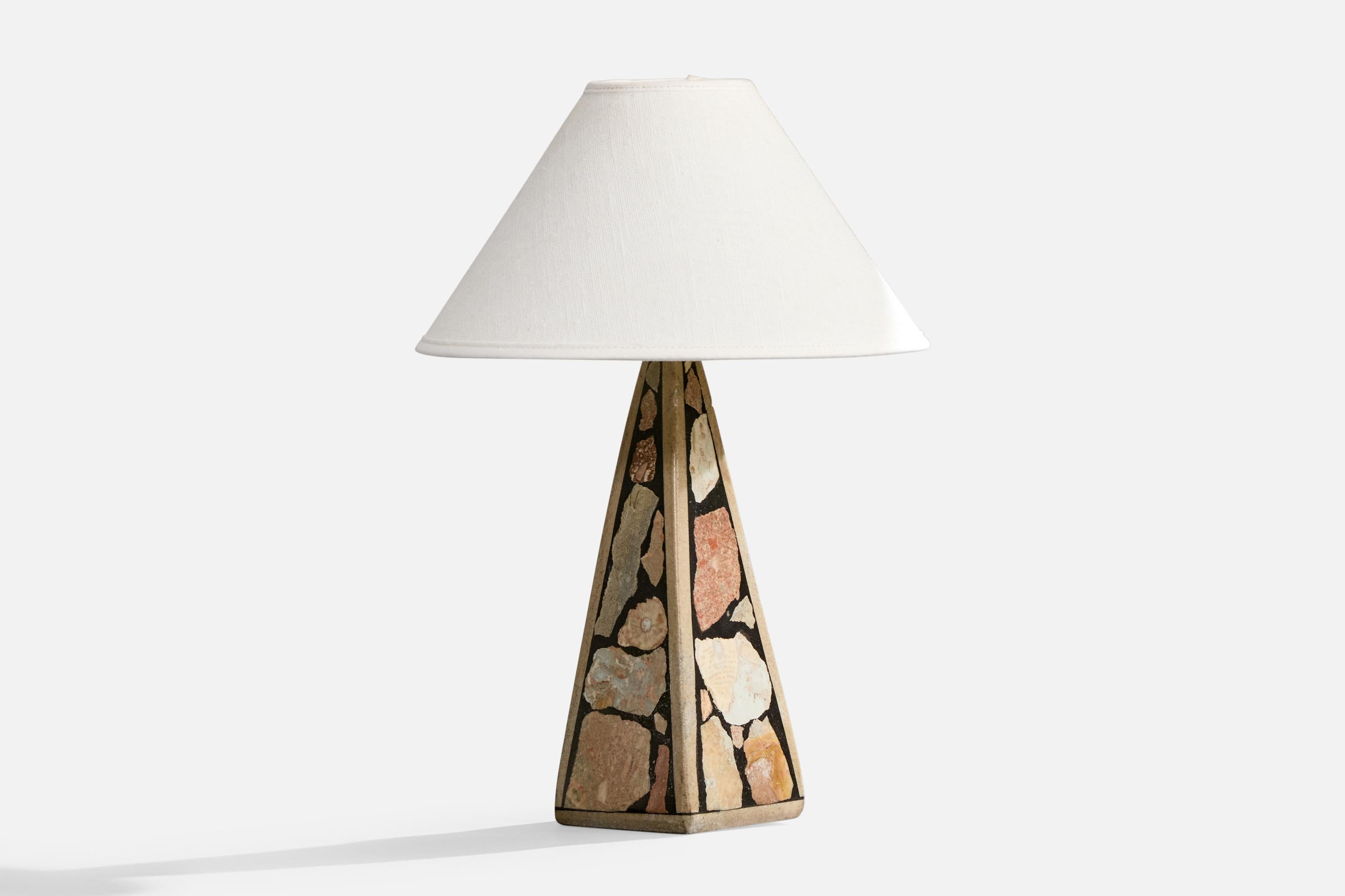 A fossil stone table lamp designed and produced in Gotland, Sweden, c. 1970s.

Dimensions of Lamp (inches): 11.3” H x 3.6” W x 3.6” D

Dimensions of Shade (inches): 3“ Top Diameter x 10“ Bottom Diameter x 6.25“ H

Dimensions of Lamp with Shade