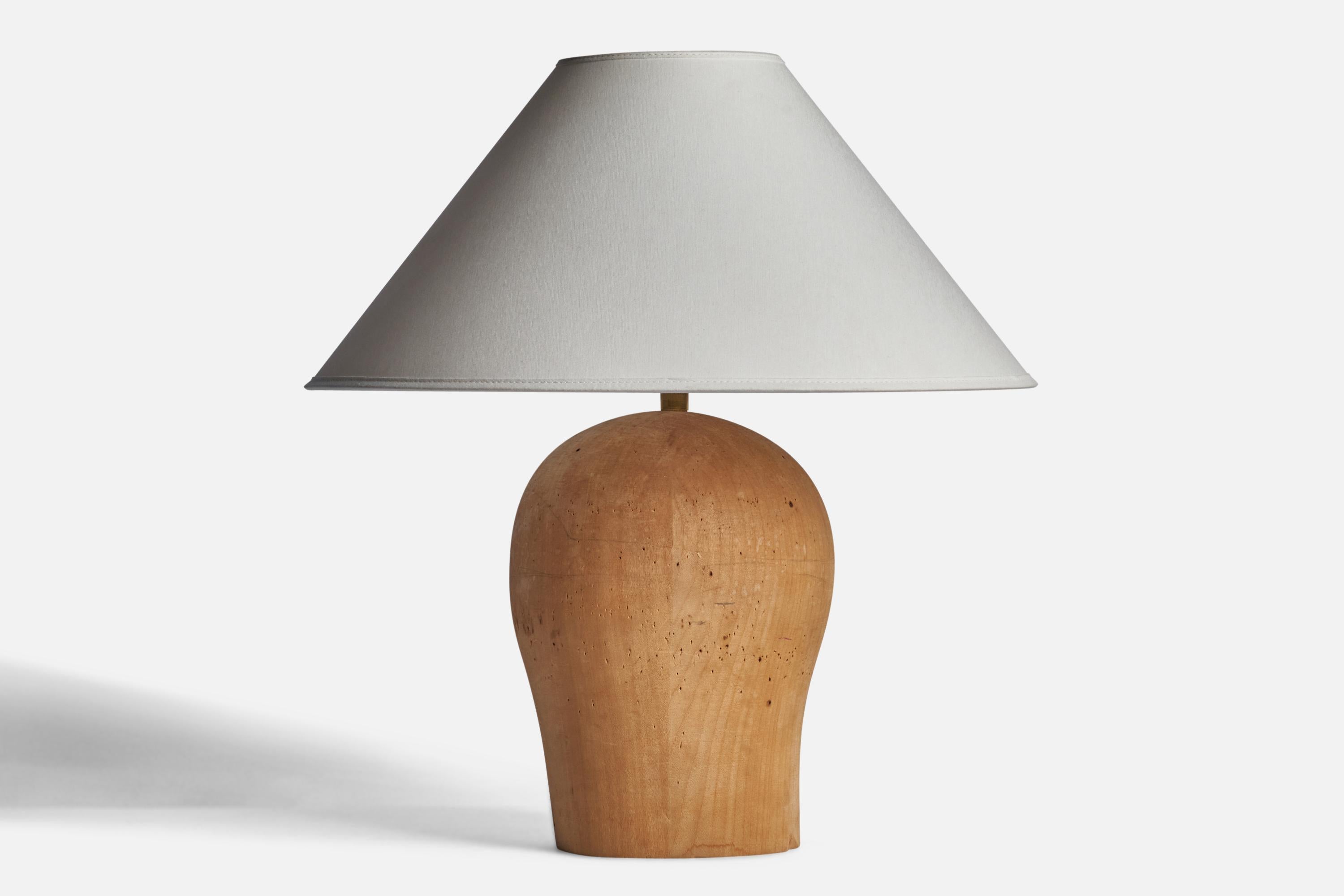 A wood table lamp designed and produced in Sweden, 1940s.

Dimensions of Lamp (inches): 12.25” H x 7.5” W x 5.75” D
Dimensions of Shade (inches): 4.5” Top Diameter x 15.75” Bottom Diameter x 9” H
Dimensions of Lamp with Shade (inches): 17.5” H x