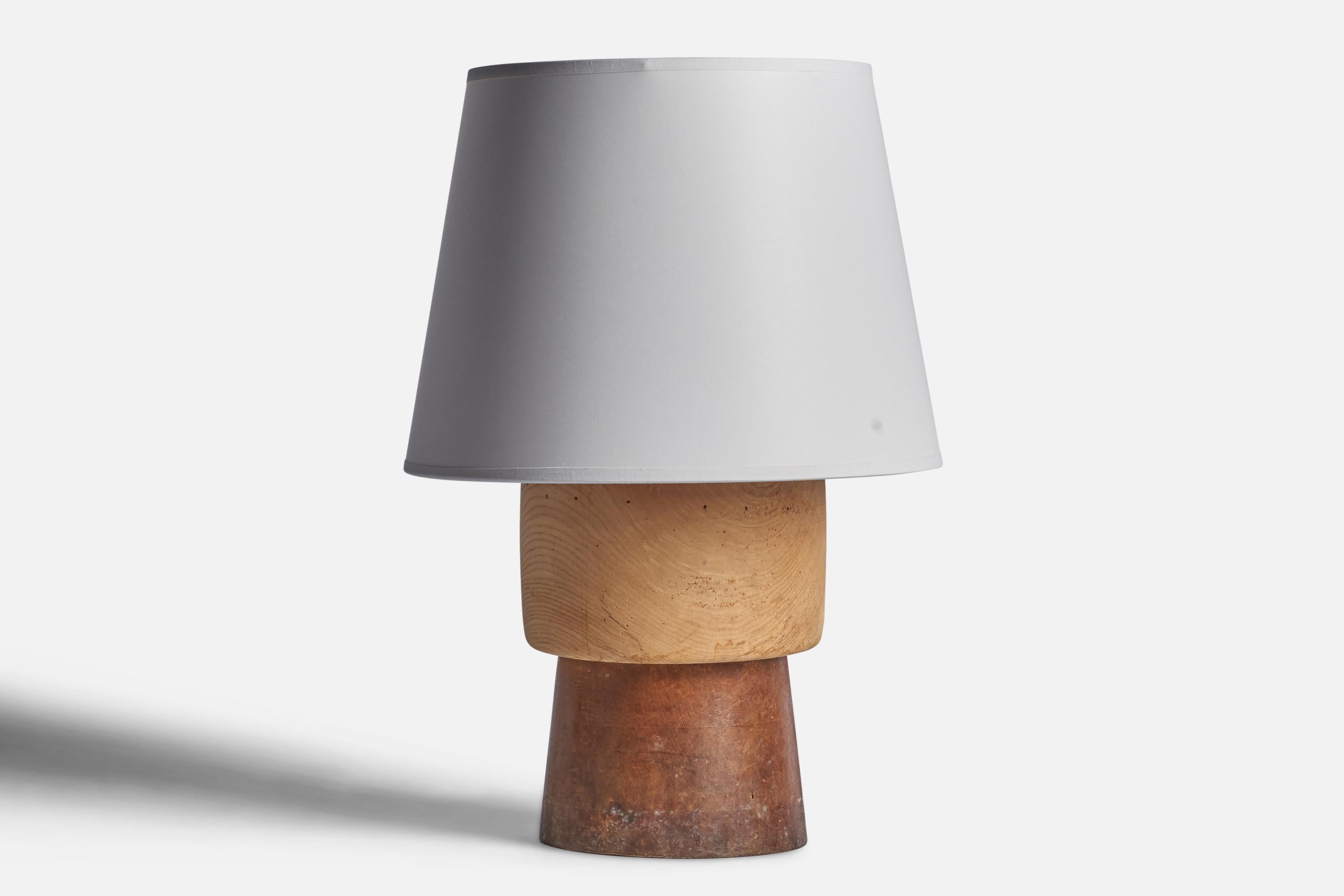 A wood table lamp designed and produced in Sweden, 1940s.

Dimensions of Lamp (inches): 12” H x 7” Diameter
Dimensions of Shade (inches): 8.75” Top Diameter x 12” Bottom Diameter x 9” H 
Dimensions of Lamp with Shade (inches): 18” H x 12”