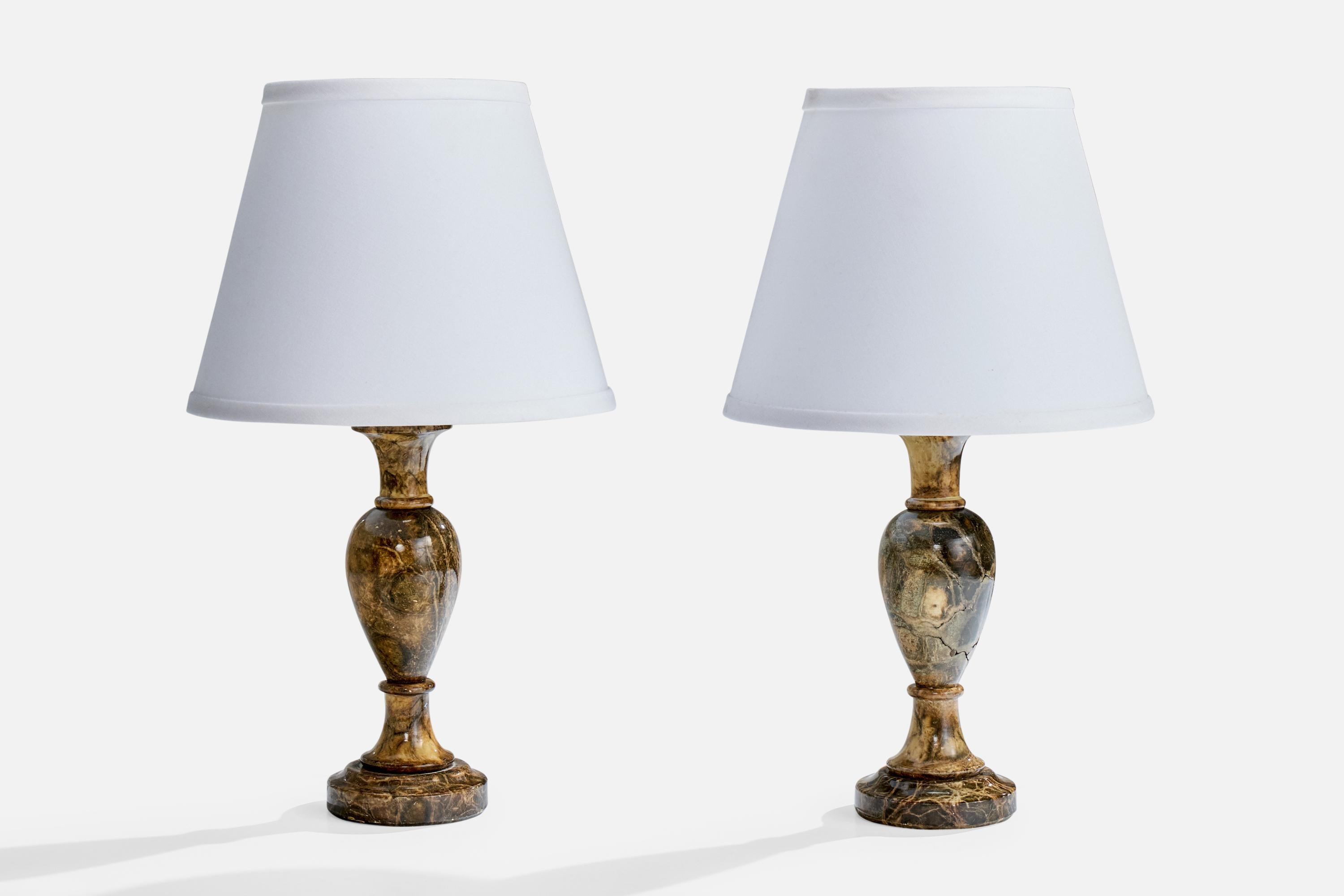 A pair of alabaster table lamp designed and produced in Sweden, c. 1980s.

Dimensions of Shade (inches): 6” Top Diameter x 10” Bottom Diameter x 8” Height

Dimensions of Lamp with Shade (inches): 17.5” Height x 10” Diameter

Dimensions of Lamp
