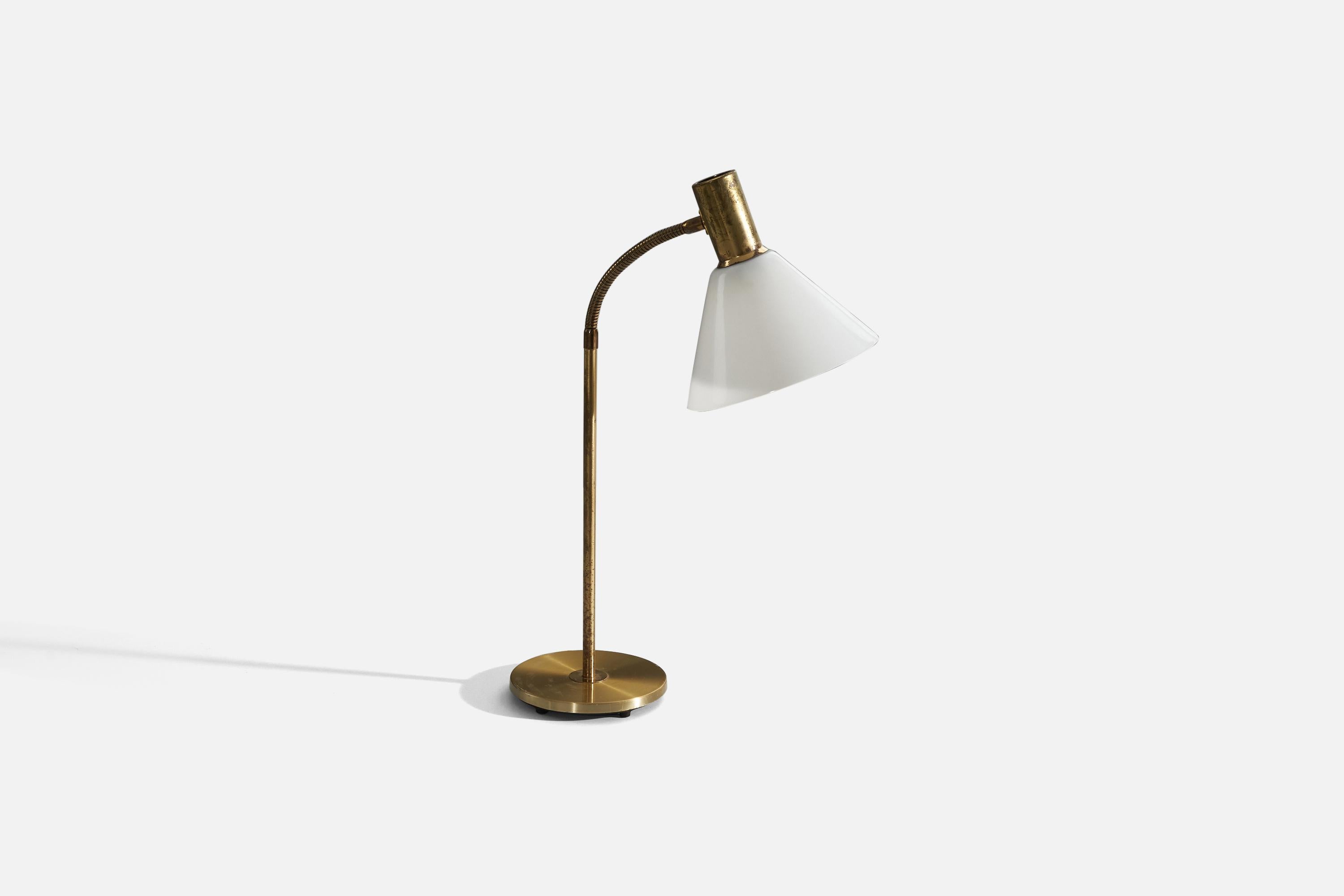 A brass and acrylic table lamp designed and produced by a Swedish designer, Sweden, c. 1960s.

Variable dimensions, measured as illustrated in the first image.
 