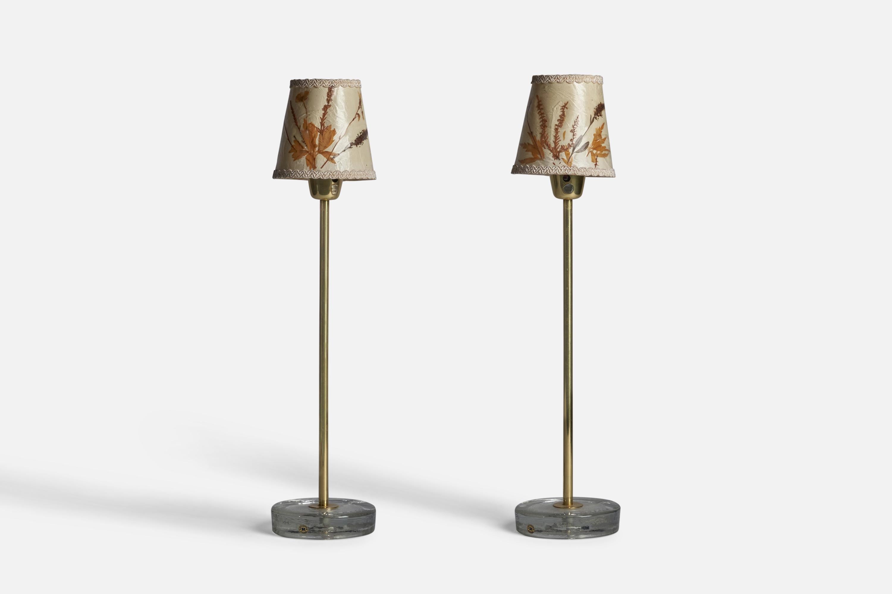 A pair of brass, glass and paper with laminated plants table lamps, designed and produced in Sweden, 1950s.

Overall Dimensions (inches): 21.5