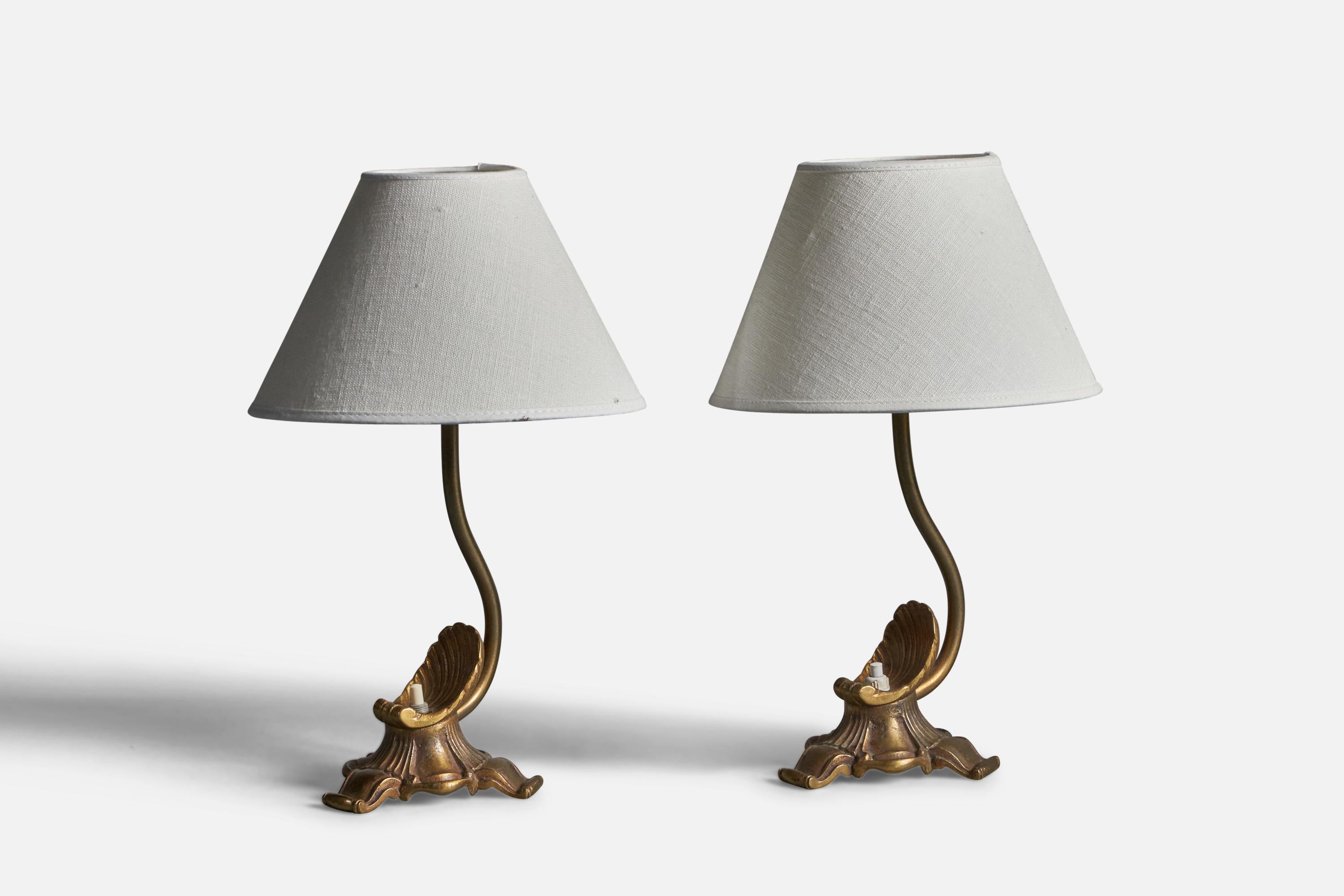 A pair of brass table lamps, designed and produced in Sweden, 1930s.

Dimensions of Lamp (inches): 10.25