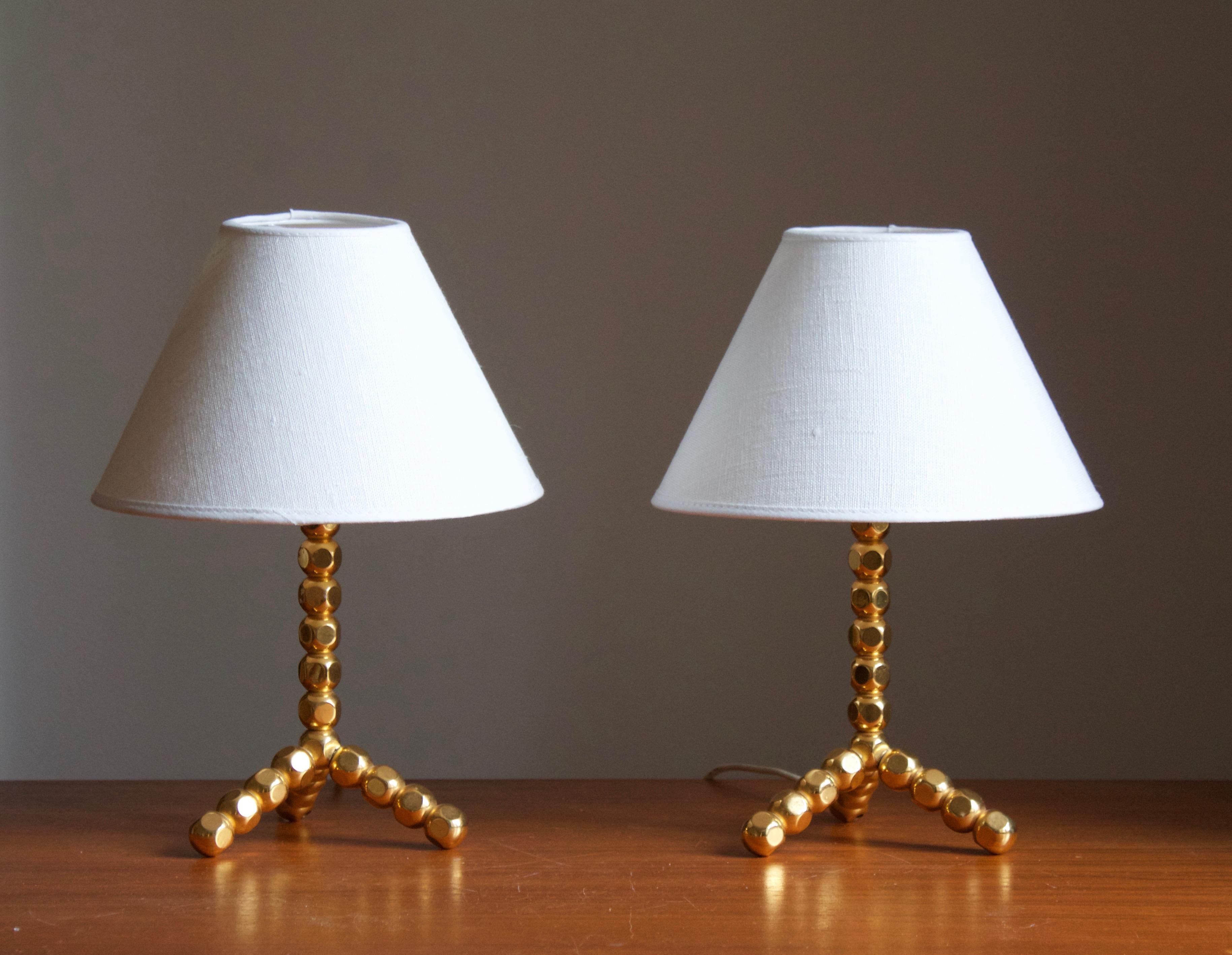An adjustable table lamp / desk light, designed and produced in Sweden, circa 1960s-1970s. 

Stated dimensions exclude lampshade, height includes socket.