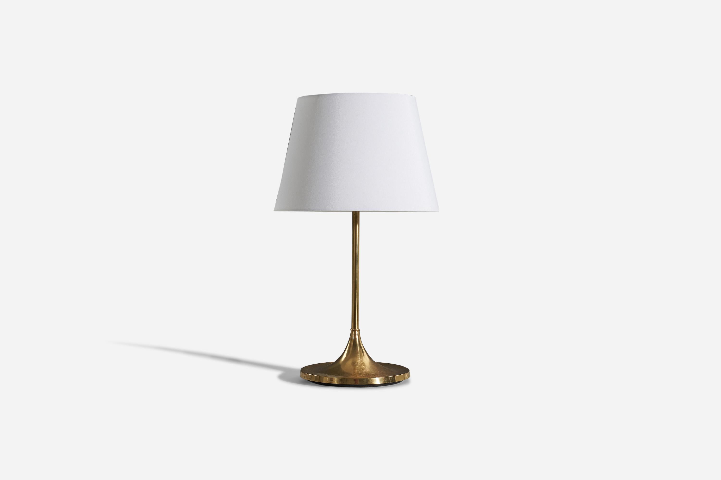 A brass table lamp designed and produced by a Swedish designer, Sweden, c. 1960s.

Sold without lampshade. 
Dimensions of Lamp (inches) : 18.125 x 9.625 x 9.625 (H x W x D)
Dimensions of Shade (inches) : 10 x 14.125 x 10 (T x B x S)
Dimension of