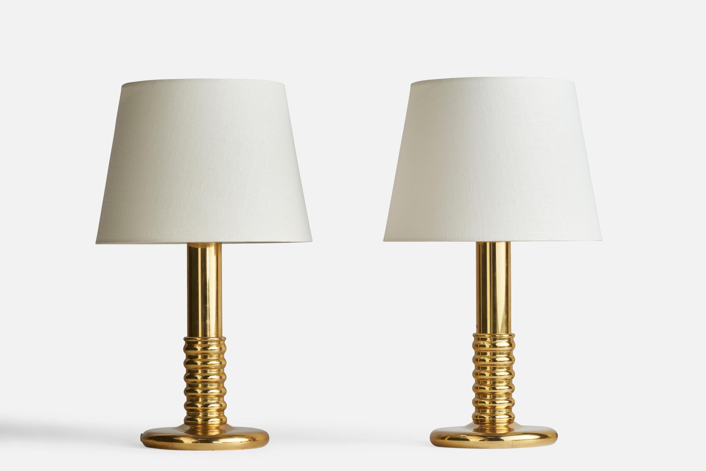 A pair of table lamps designed and produced in Sweden, 1970s.

Dimensions of Lamp (inches): 14.5” H x 7” Diameter
Dimensions of Shade (inches): 9” Top Diameter x 12” Bottom Diameter x 9” H
Dimensions of Lamp with Shade (inches): 20” H x 12”