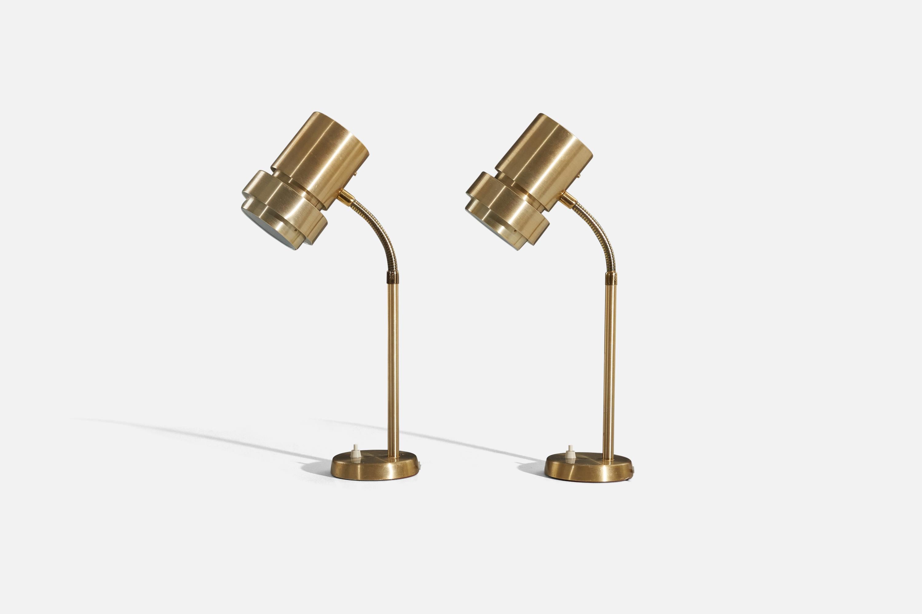 A pair of brass table lamps designed and produced by a Swedish designer, Sweden, c. 1960s.

