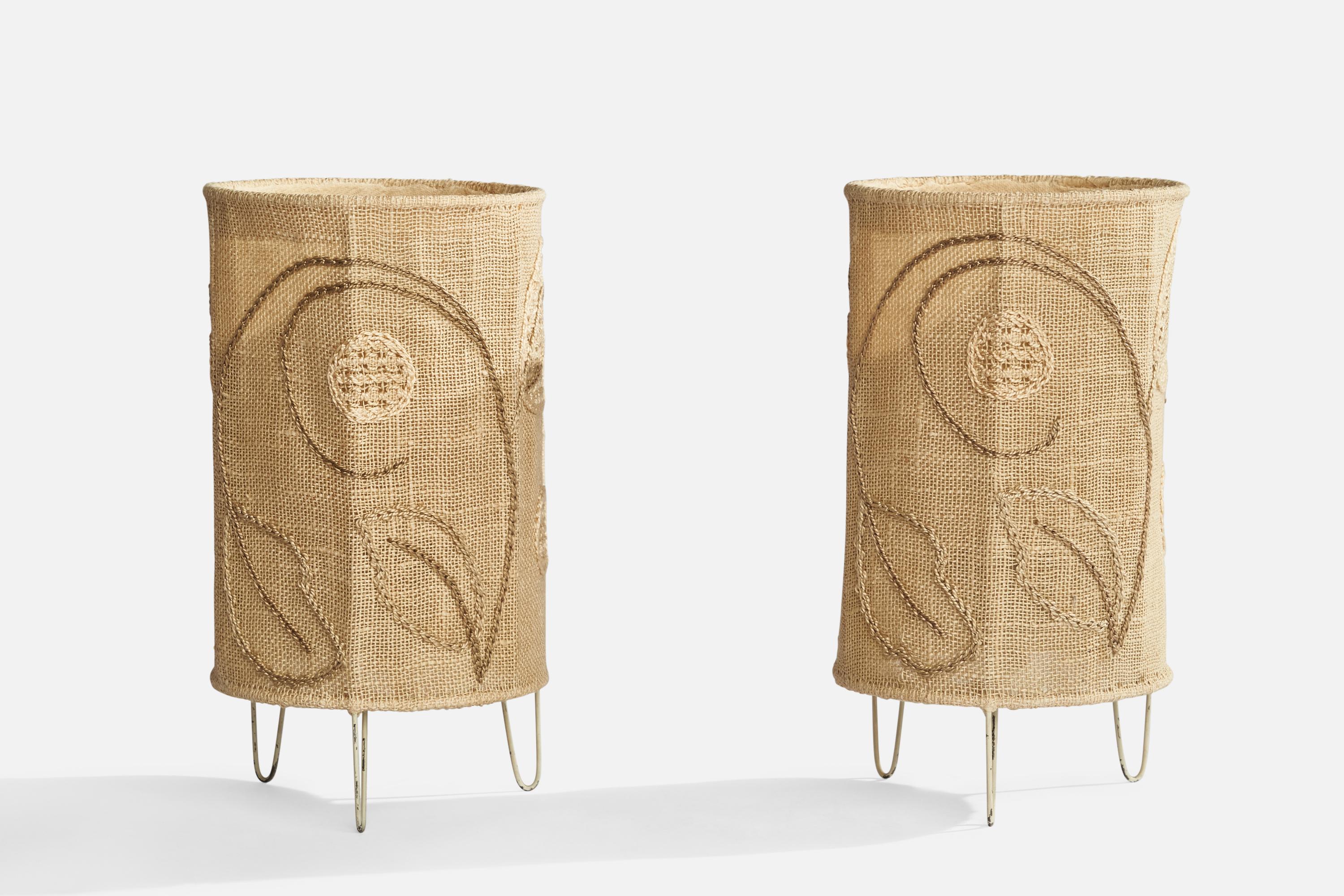 A pair of hand-embroidered burlap and white-lacquered metal table lamps designed and produced in Sweden, 1960s.

Overall Dimensions (inches): 11” H x 6”  D
Stated dimensions include shade.
Bulb Specifications: E-26 Bulb
Number of Sockets: 2
All