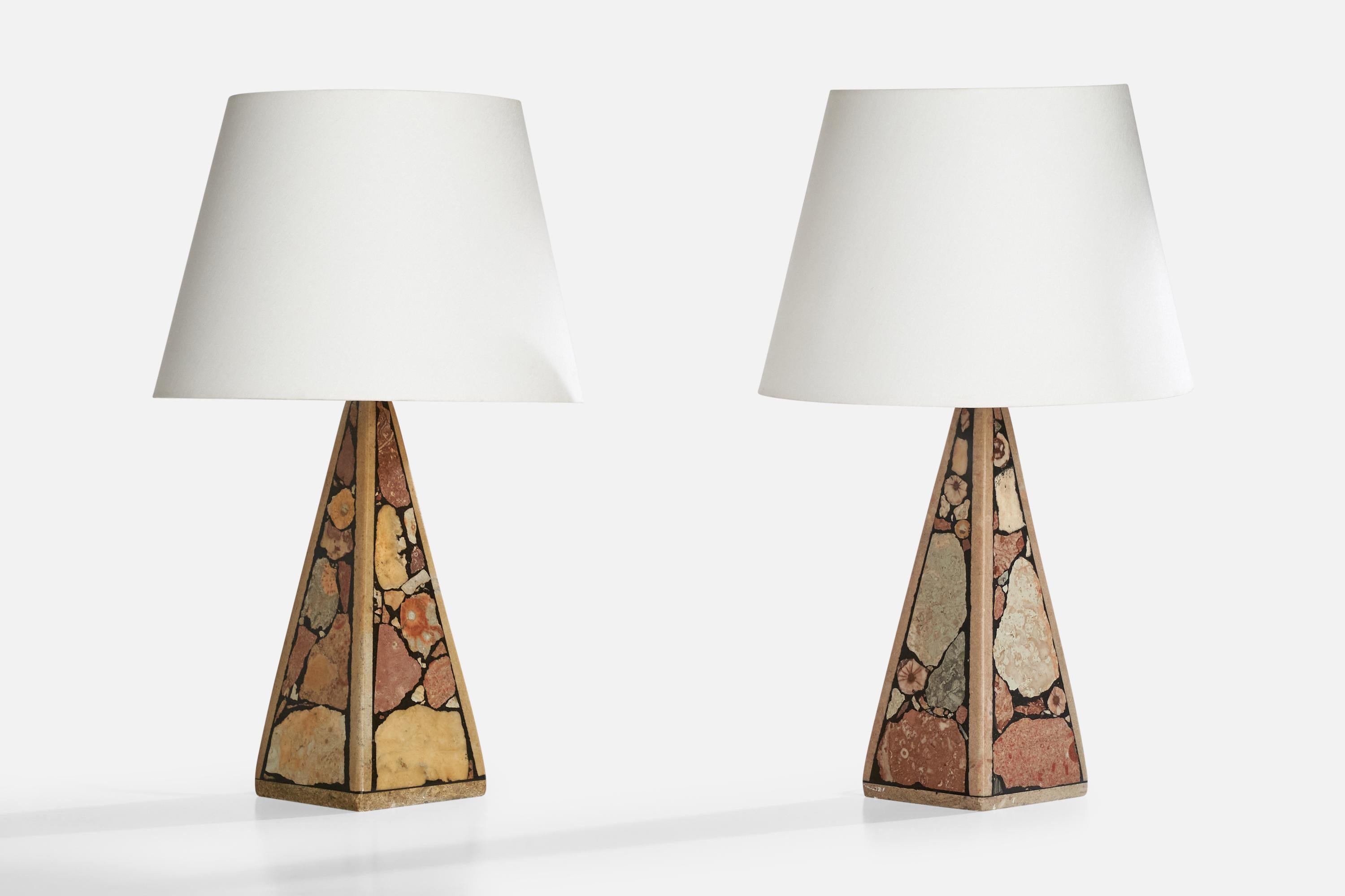 A pair of fossil stone table lamps designed and produced in Gotland, Sweden, 1970s.

Dimensions of Lamp (inches): 11.375“ H x 3.875” W x 3.875“ D

Dimensions of Shade (inches): 6.75“ Top Diameter x 10“ Bottom Diameter x 7.125” H

Dimensions of Lamp