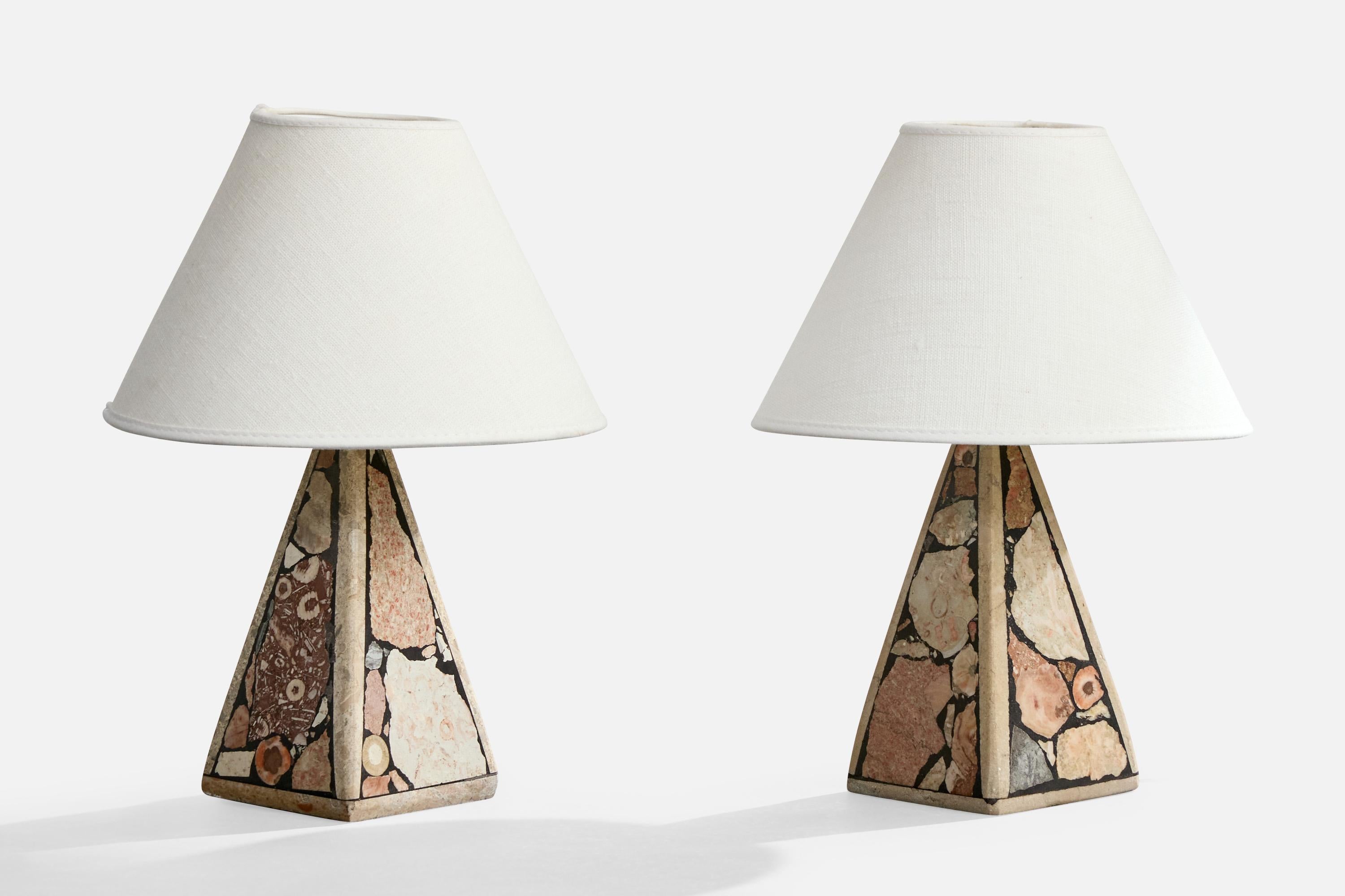 A pair of fossil stone table lamps designed and produced in Sweden, c. 1970s.

Dimensions of Lamp (inches): 8.1“ H x 3.5“ Diameter

Dimensions of Shade (inches): 3.25” Top Diameter x 8” Bottom Diameter x 5.5“ H

Dimensions of Lamp with Shade