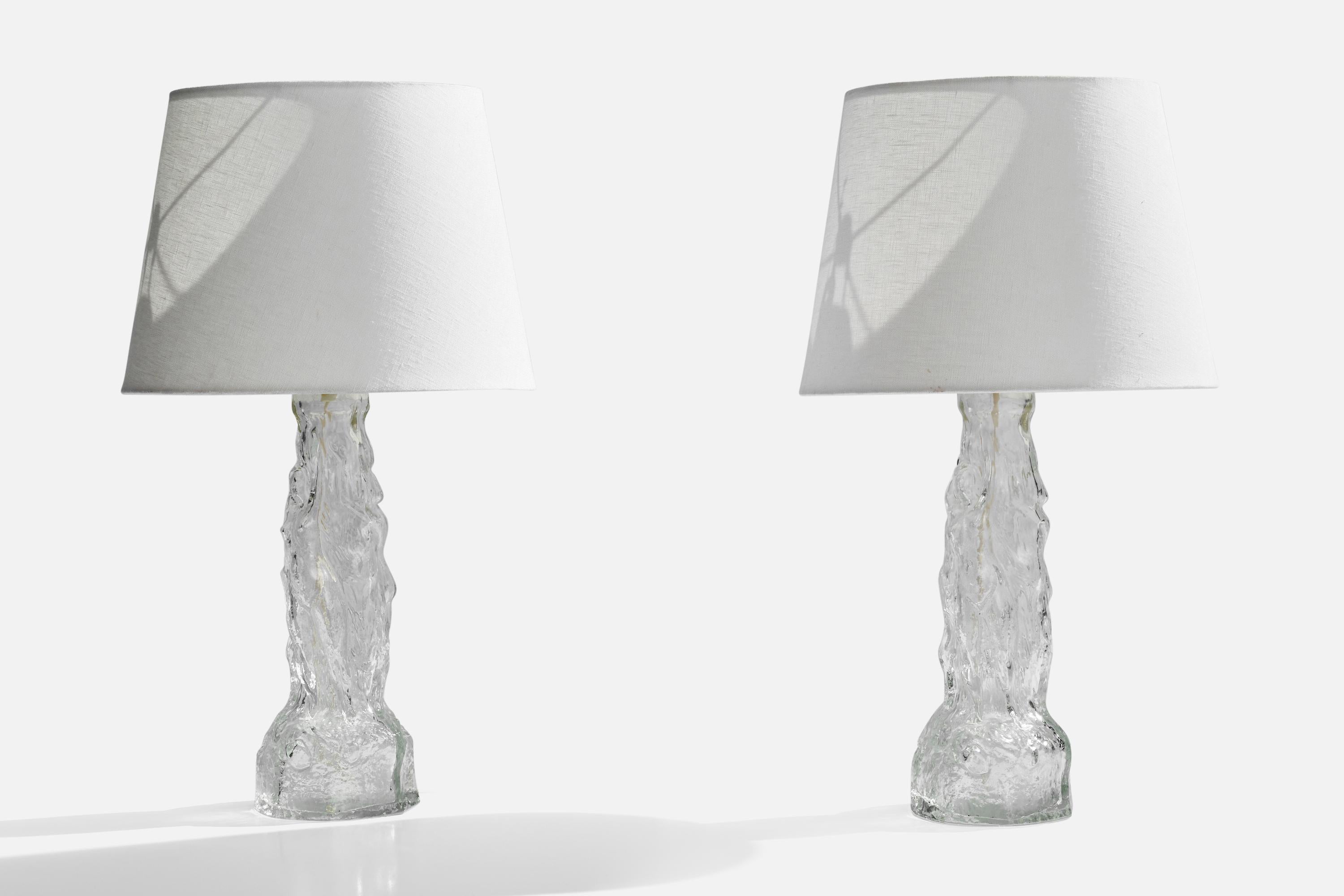 A pair of glass and brass table lamps designed and produced in Sweden, 1960s.

Dimensions of Lamp (inches): 15.5” H x 5.5”  Diameter
Dimensions of Shade (inches): 9” Top Diameter x 12” Bottom Diameter x 9” H
Dimensions of Lamp with Shade (inches):