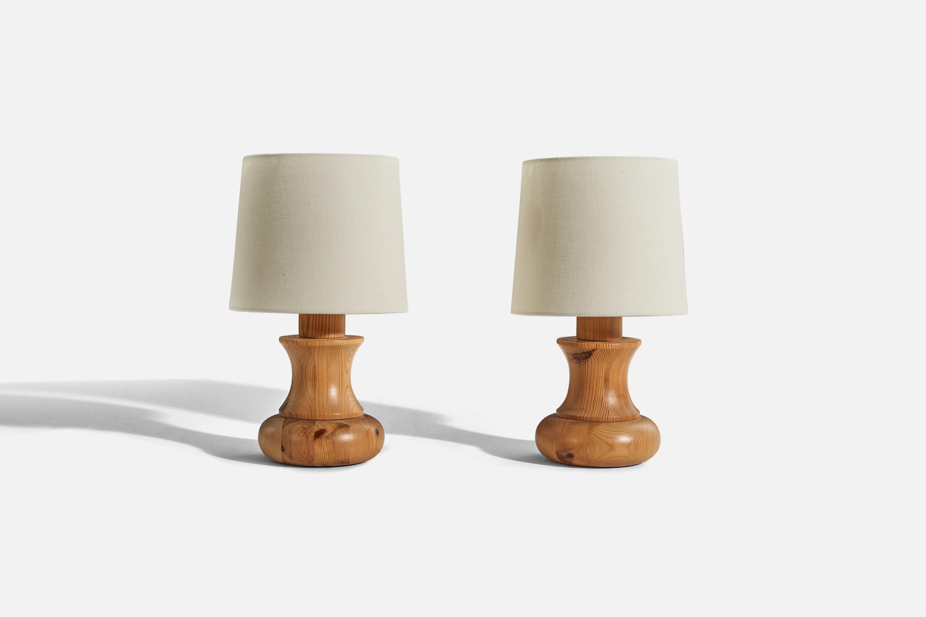 A pair of pine table lamps designed and produced in Sweden, 1970s. 

Sold without lampshade. 
Dimensions of Lamp (inches) : 8.31 x 5.87 x 5.87 (H x W x D)
Dimensions of Shade (inches) : 7 x 8 x 7 (T x B x S)
Dimension of Lamp with Shade