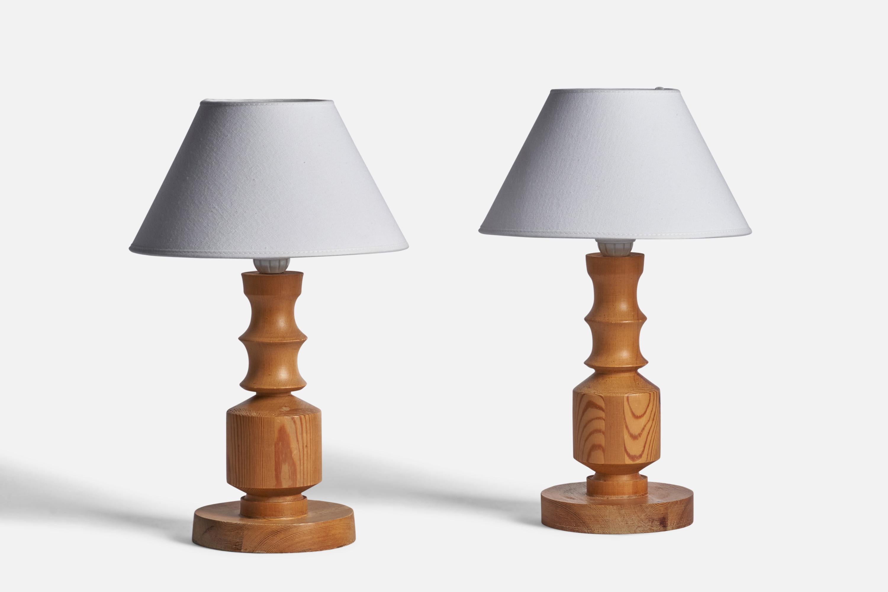 A pair of pine table lamps designed and produced in Sweden, 1970s.

Dimensions of Lamp (inches): 12