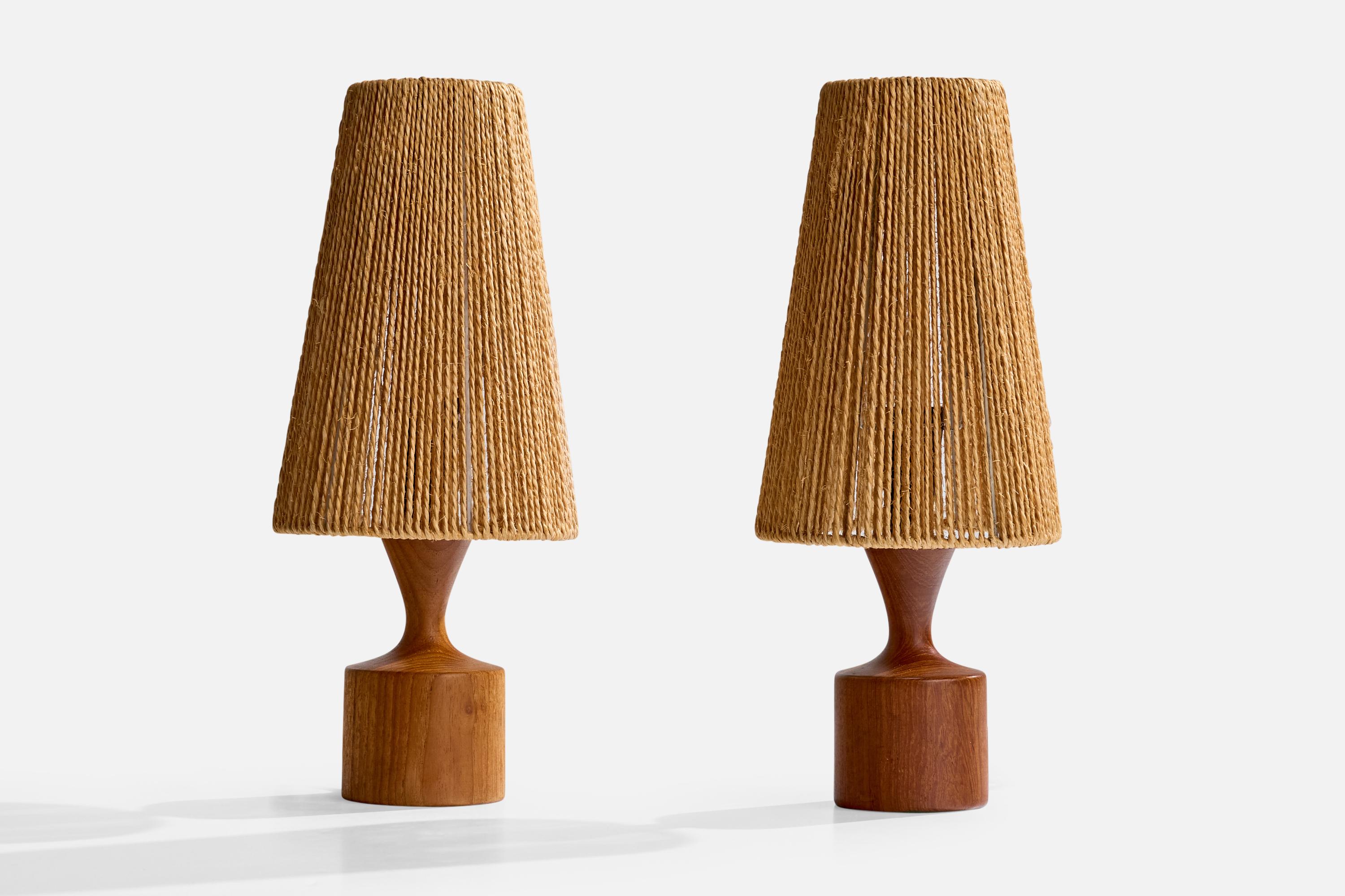 A pair of teak and jute cord table lamps designed and produced in Sweden, c. 1960s.

Dimensions of Lamp with Shade (inches): 13.25