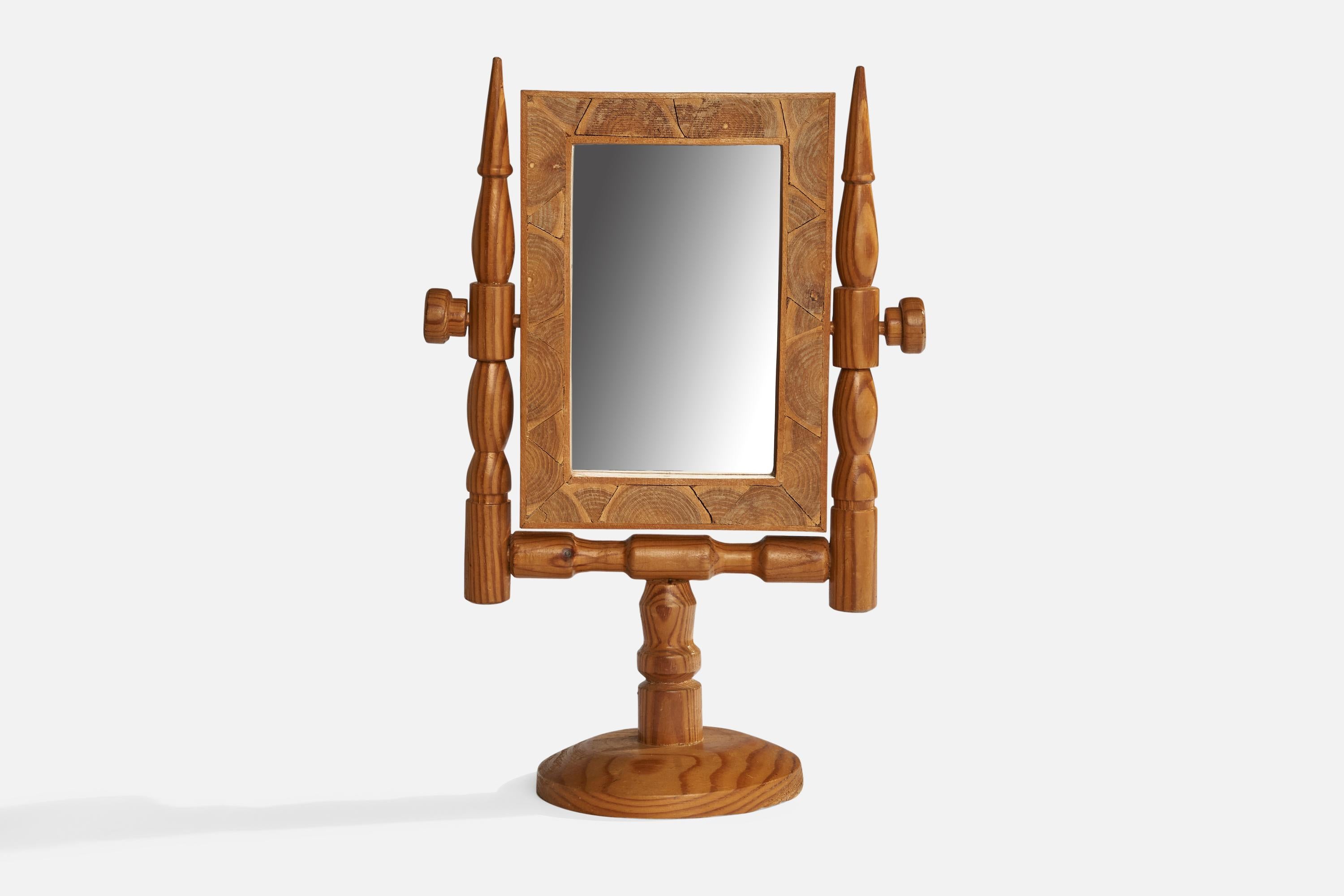 An adjustable pine and spalting table mirror designed and produced in Sweden, c. 1960s.