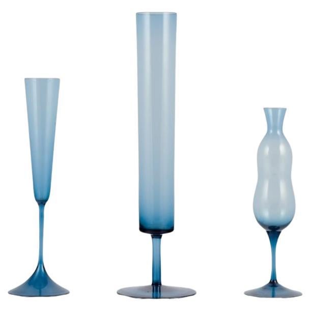 Swedish designer, three slim vases in art glass. Appprox. 1970s